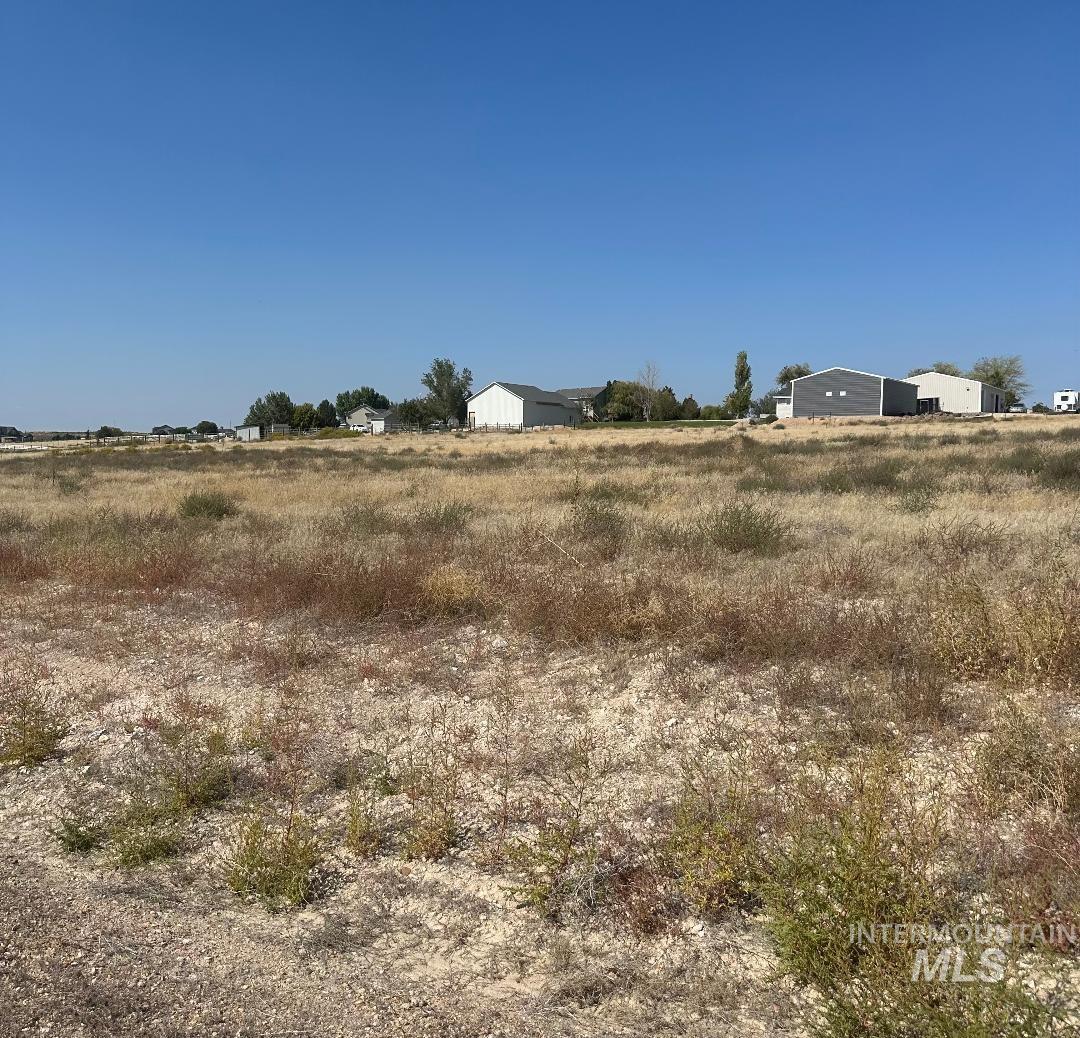 View of yard featuring a view of rural / pastoral area