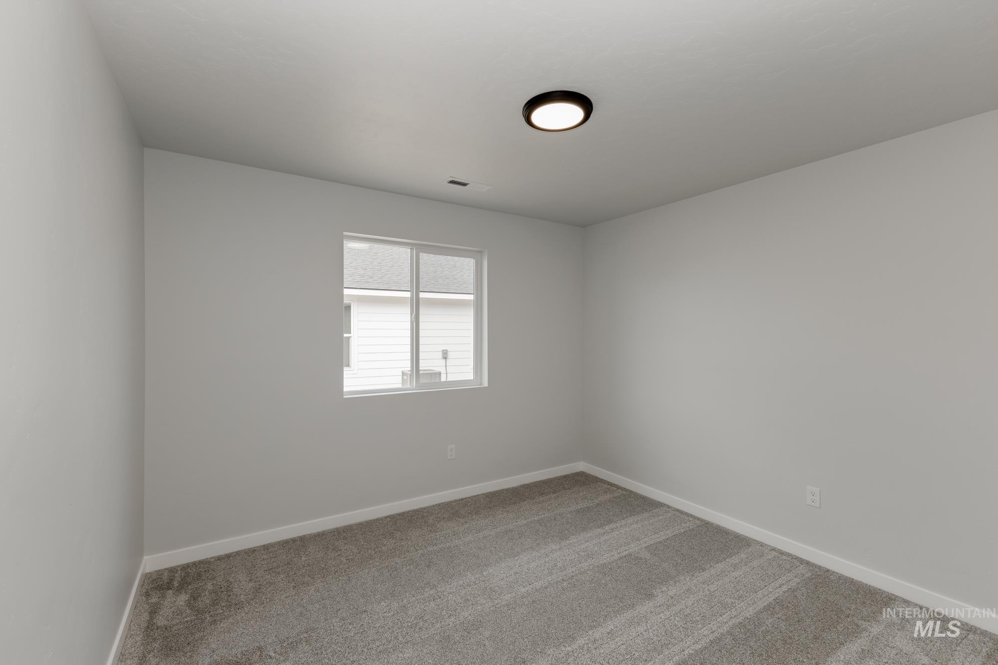 Spare room with carpet
