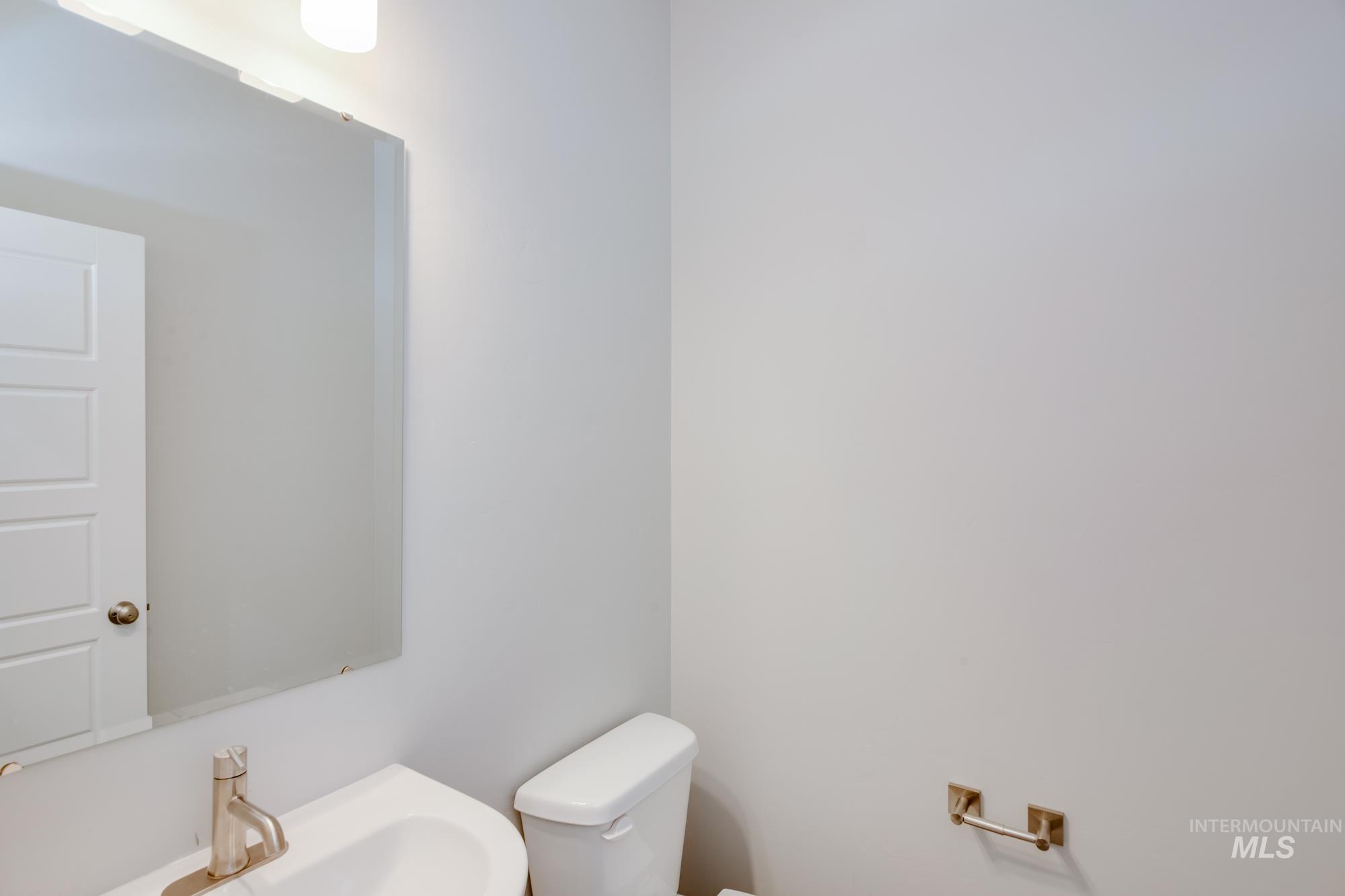 Bathroom featuring toilet and a sink