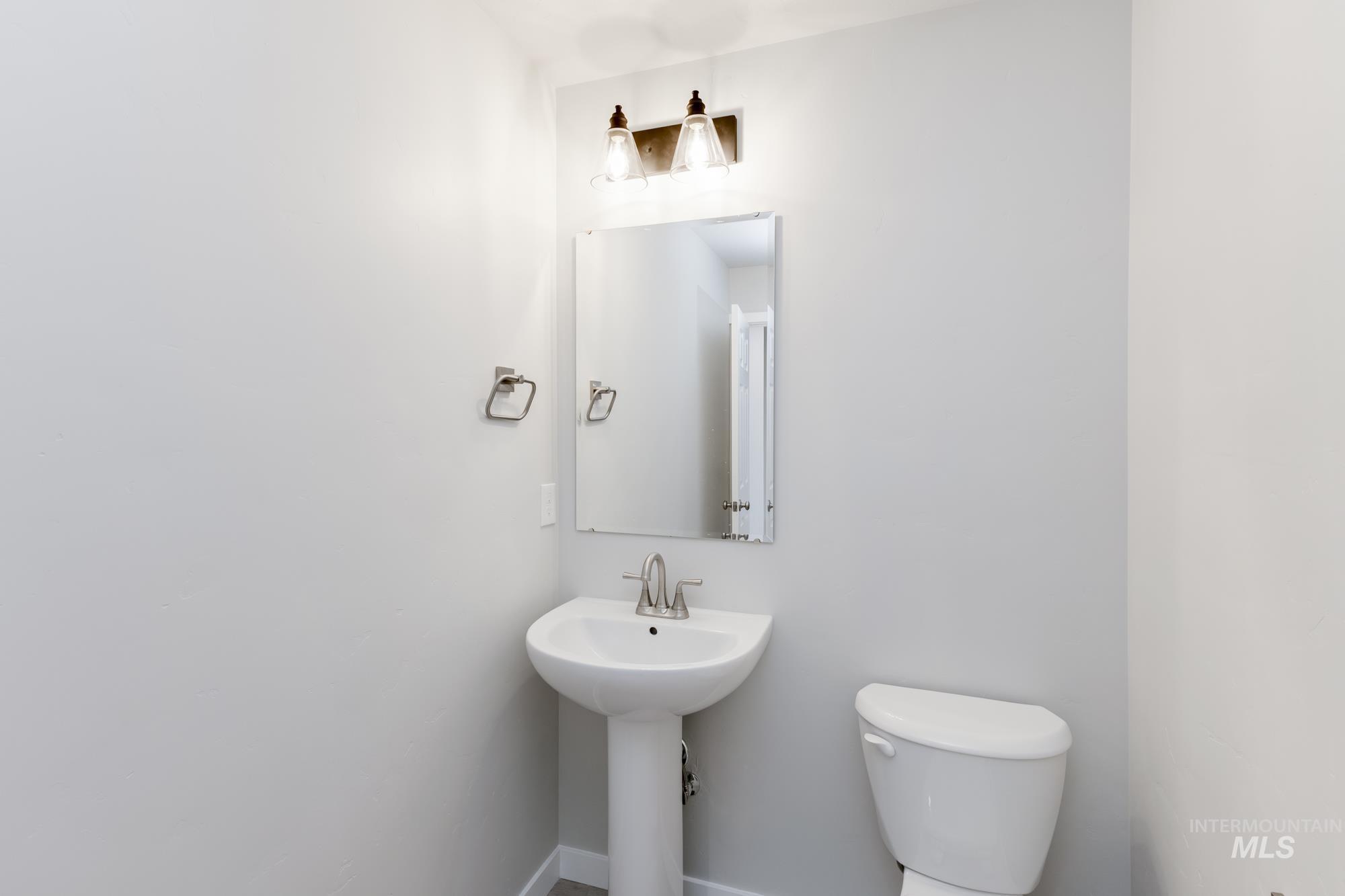 Half bathroom featuring toilet