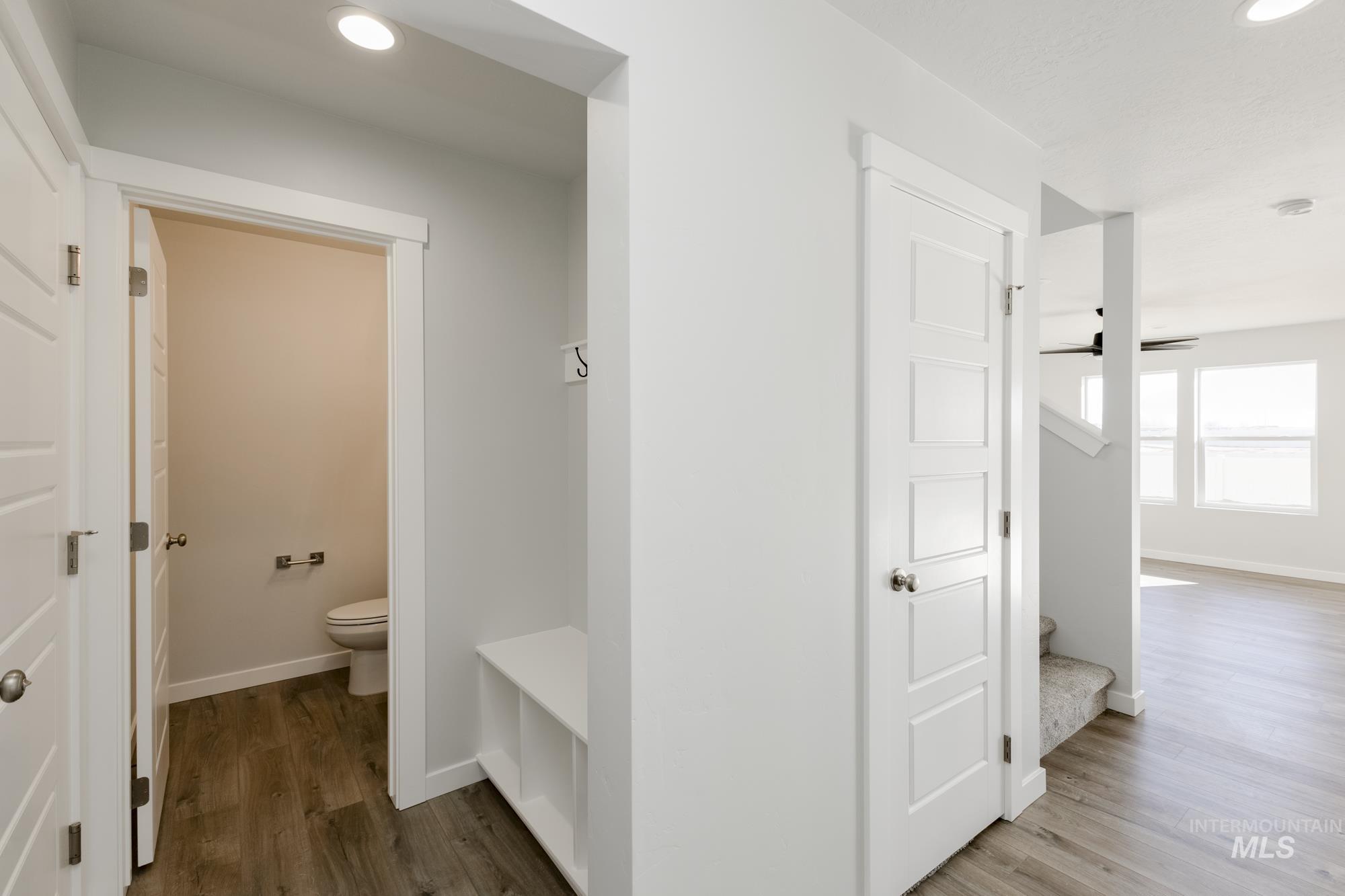 Bathroom with wood finished floors and recessed lighting