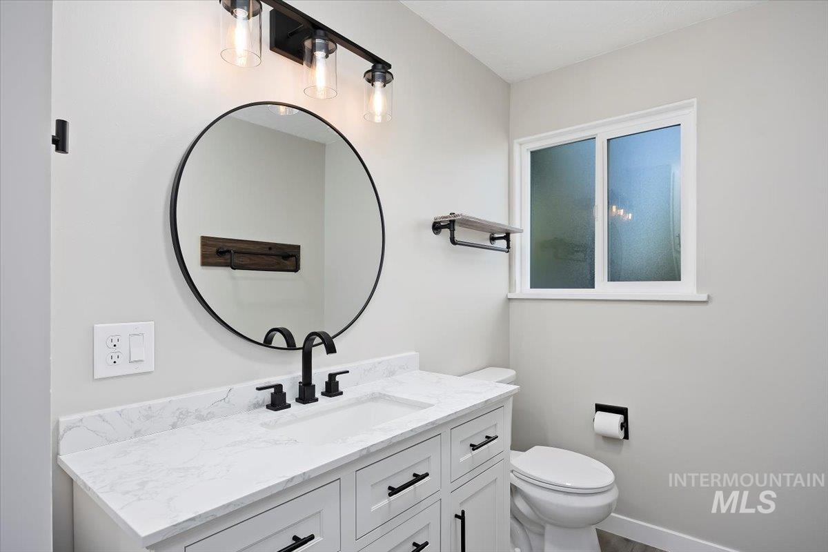 Bathroom with vanity and toilet