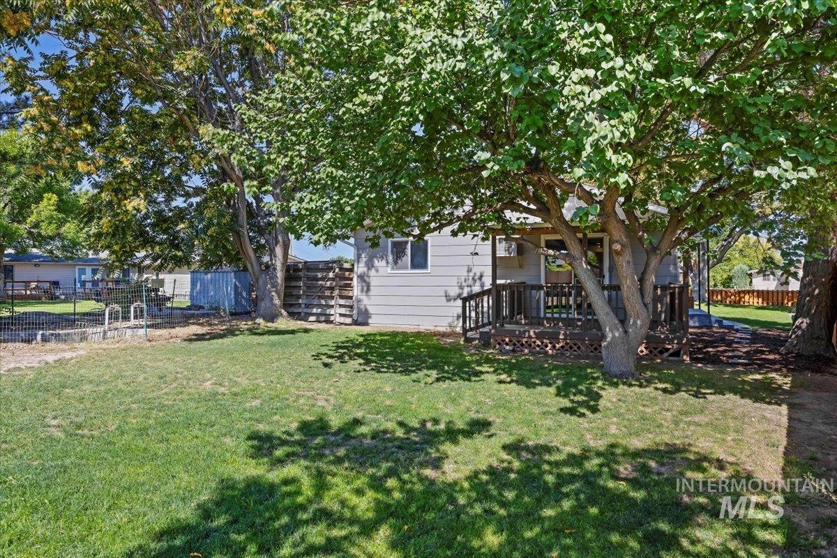 View of yard featuring a deck