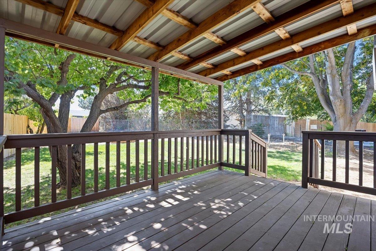 Deck featuring a fenced backyard
