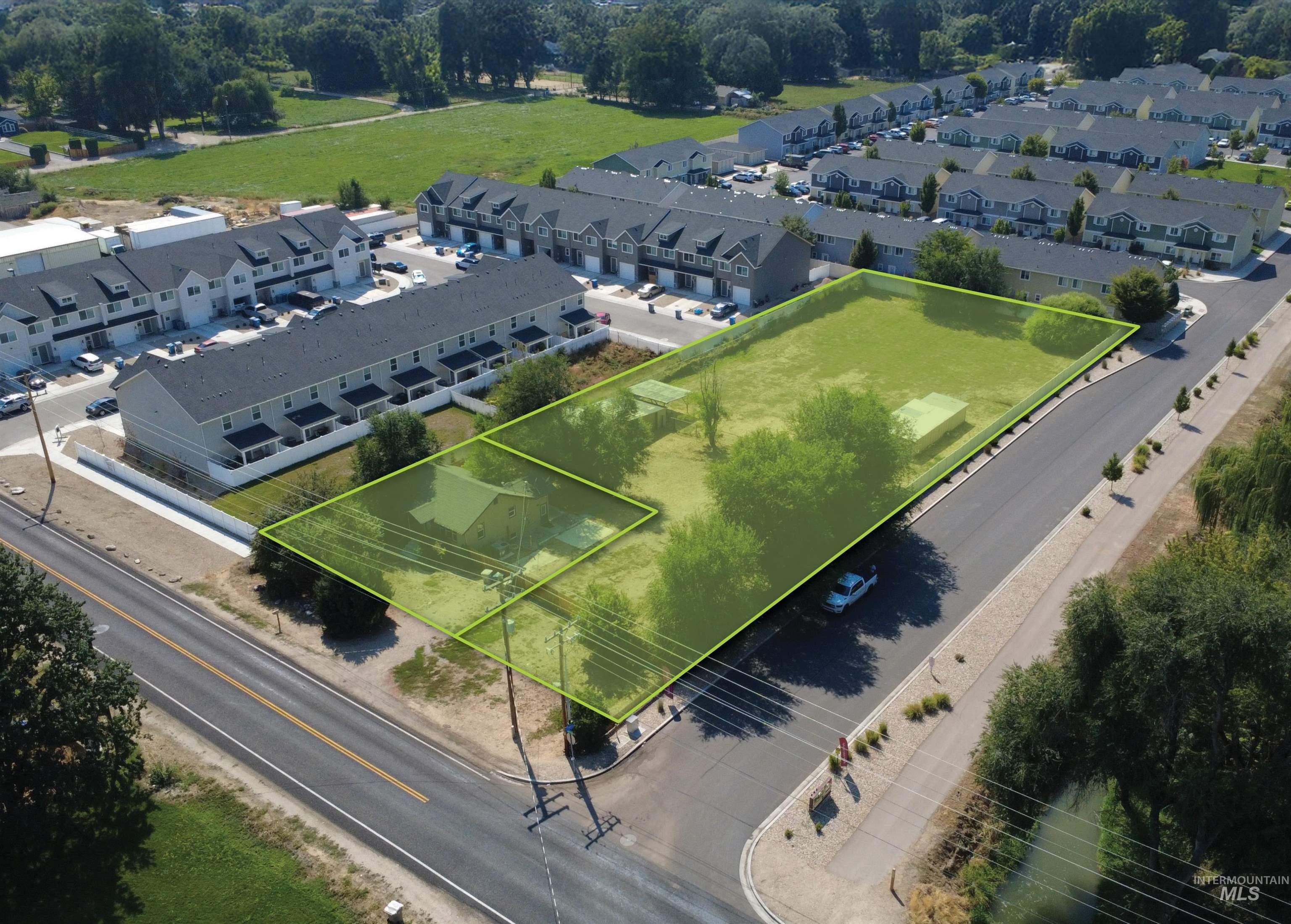 Aerial perspective of suburban area with property boundaries highlighted
