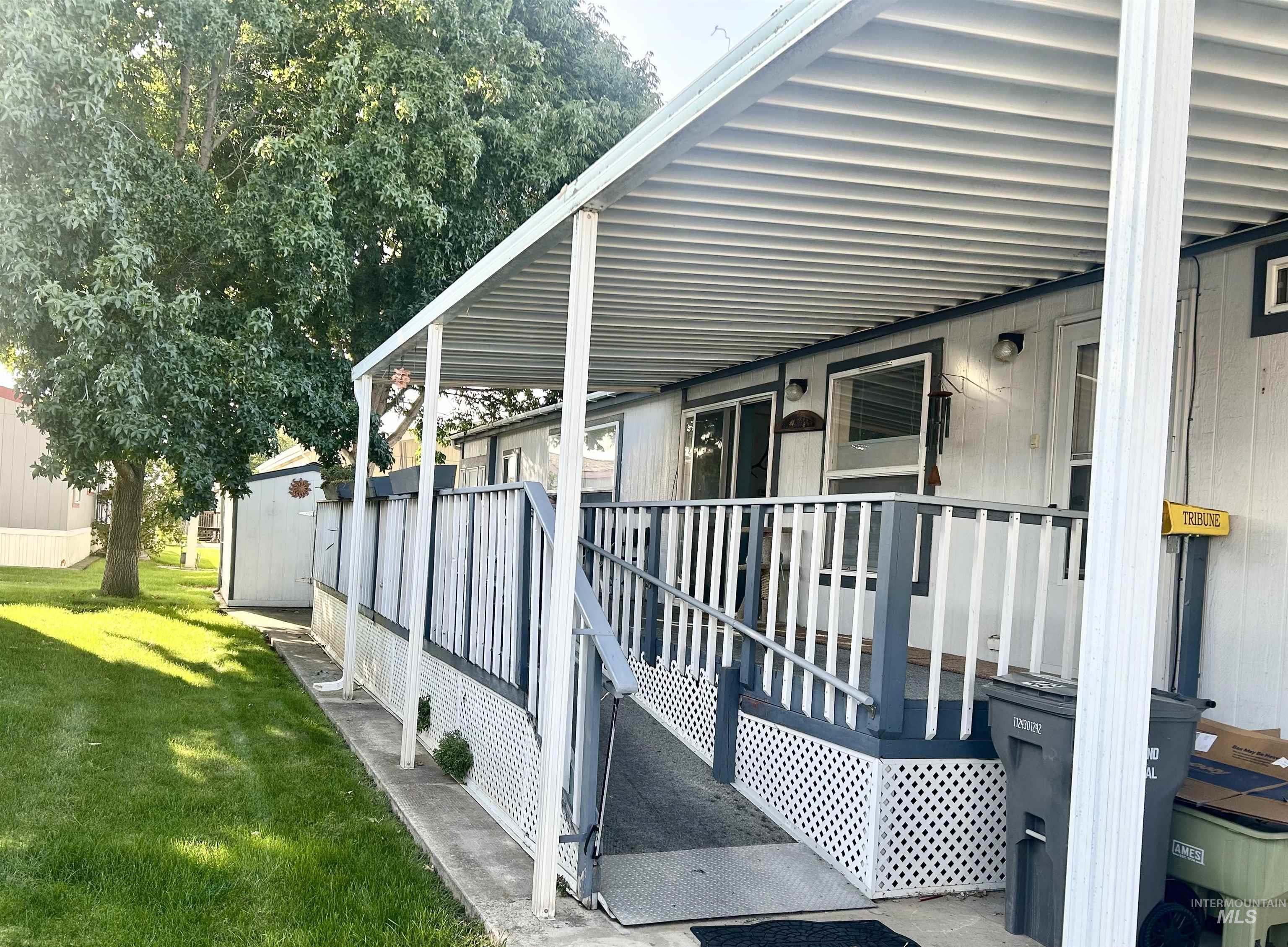 View of home's exterior with a lawn