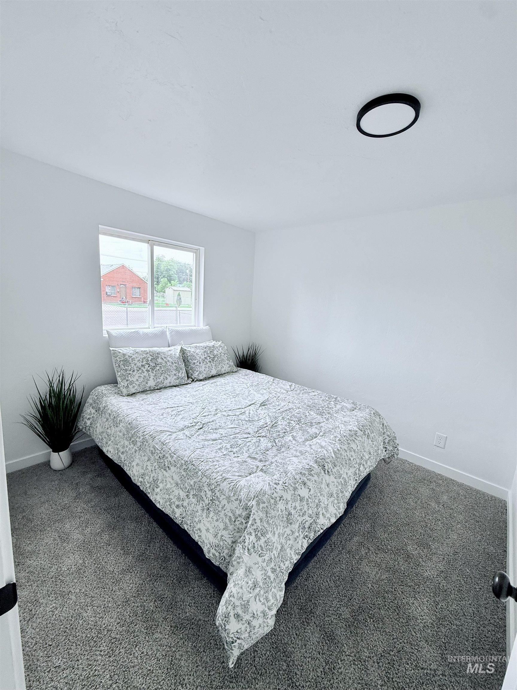 Bedroom with carpet floors