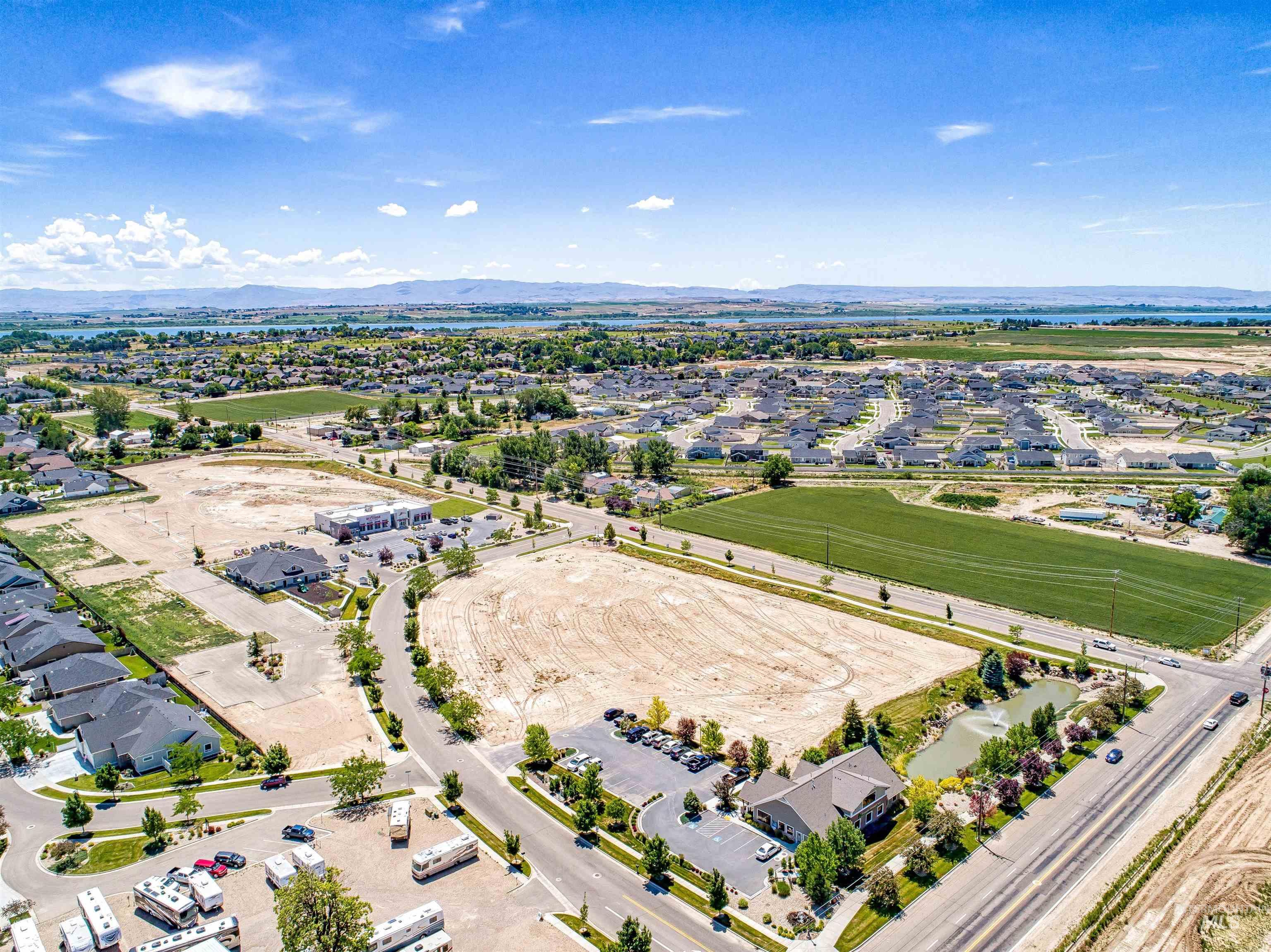 Aerial perspective of suburban area with a mountain backdrop