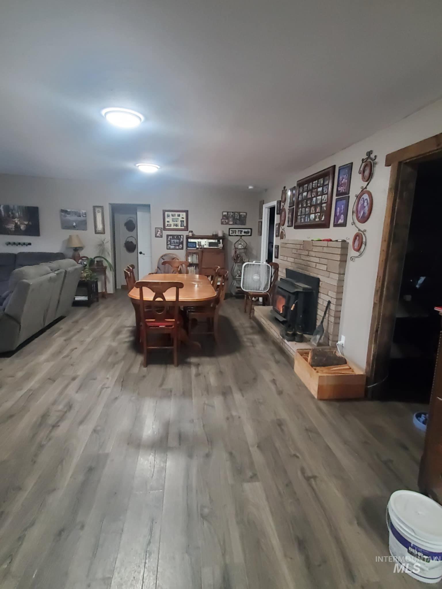 Dining space with wood finished floors
