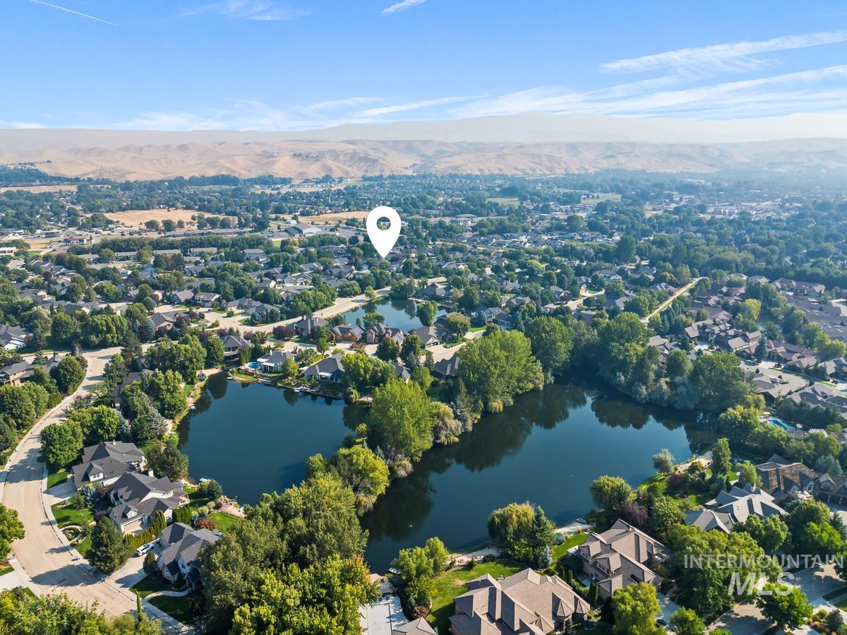 Aerial view of residential area with a water and mountain view