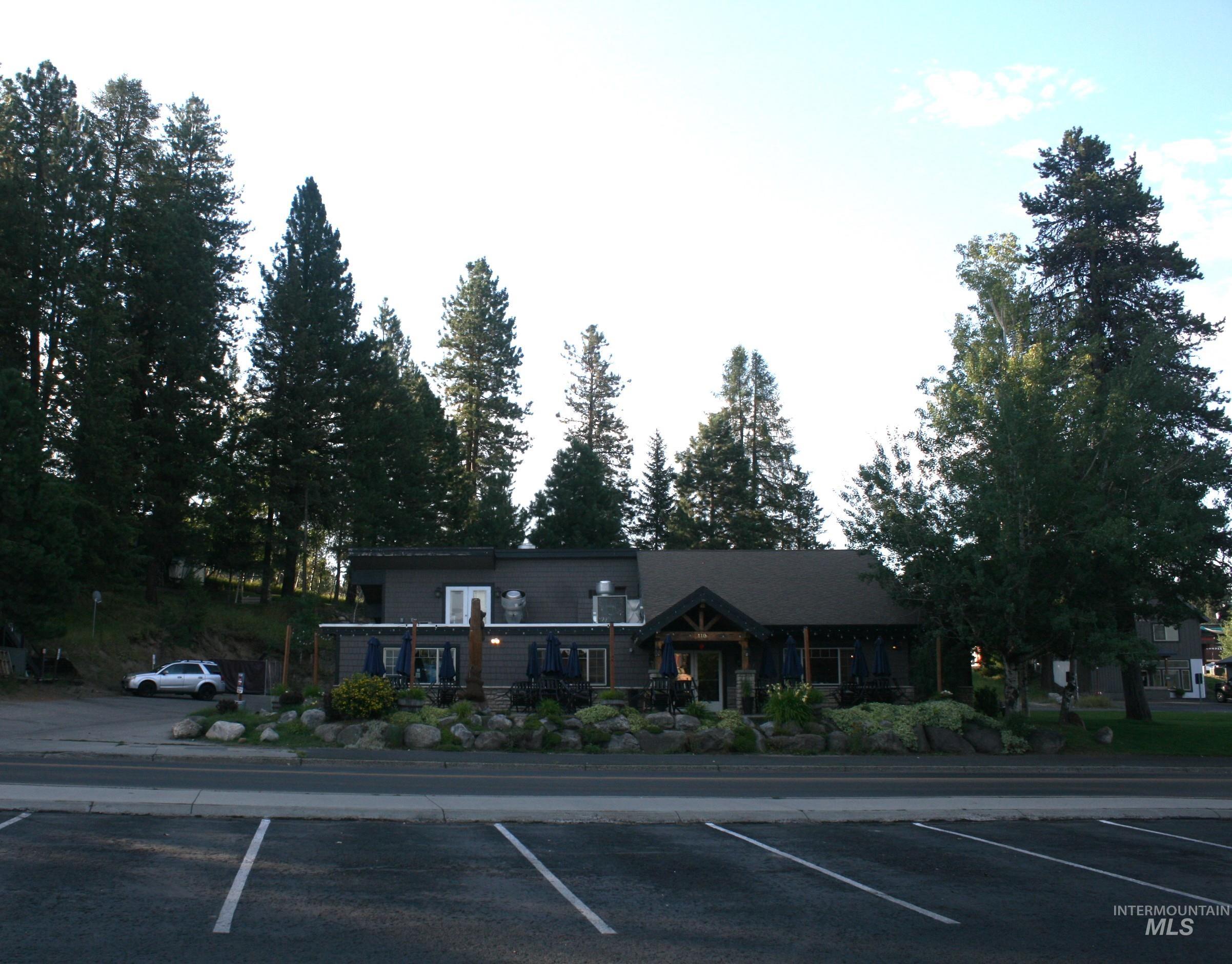 View of front of property featuring uncovered parking