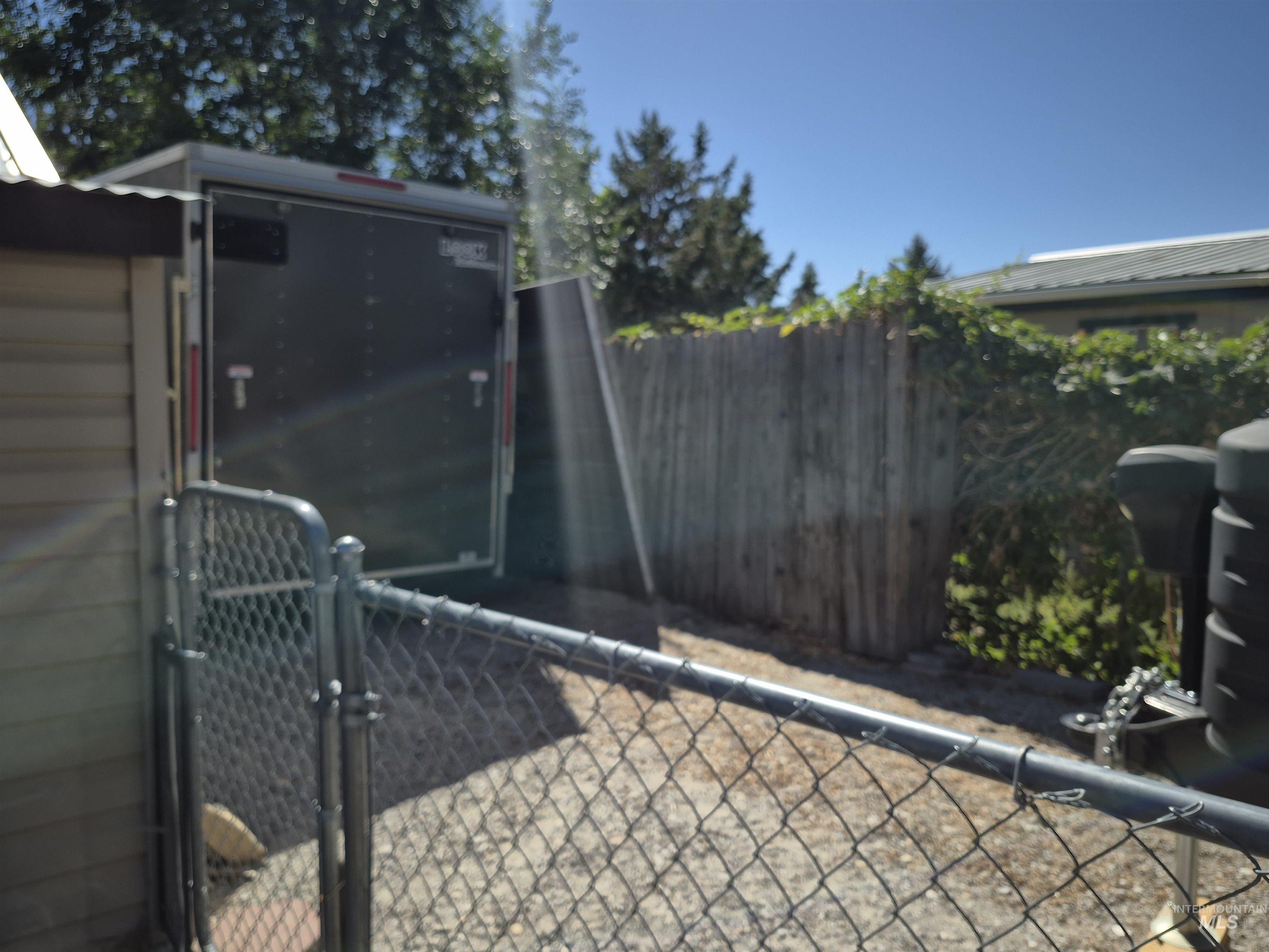 View of yard with a gate