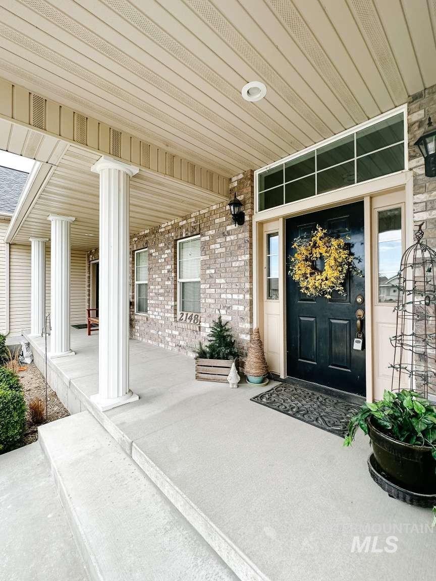 Property entrance featuring a porch