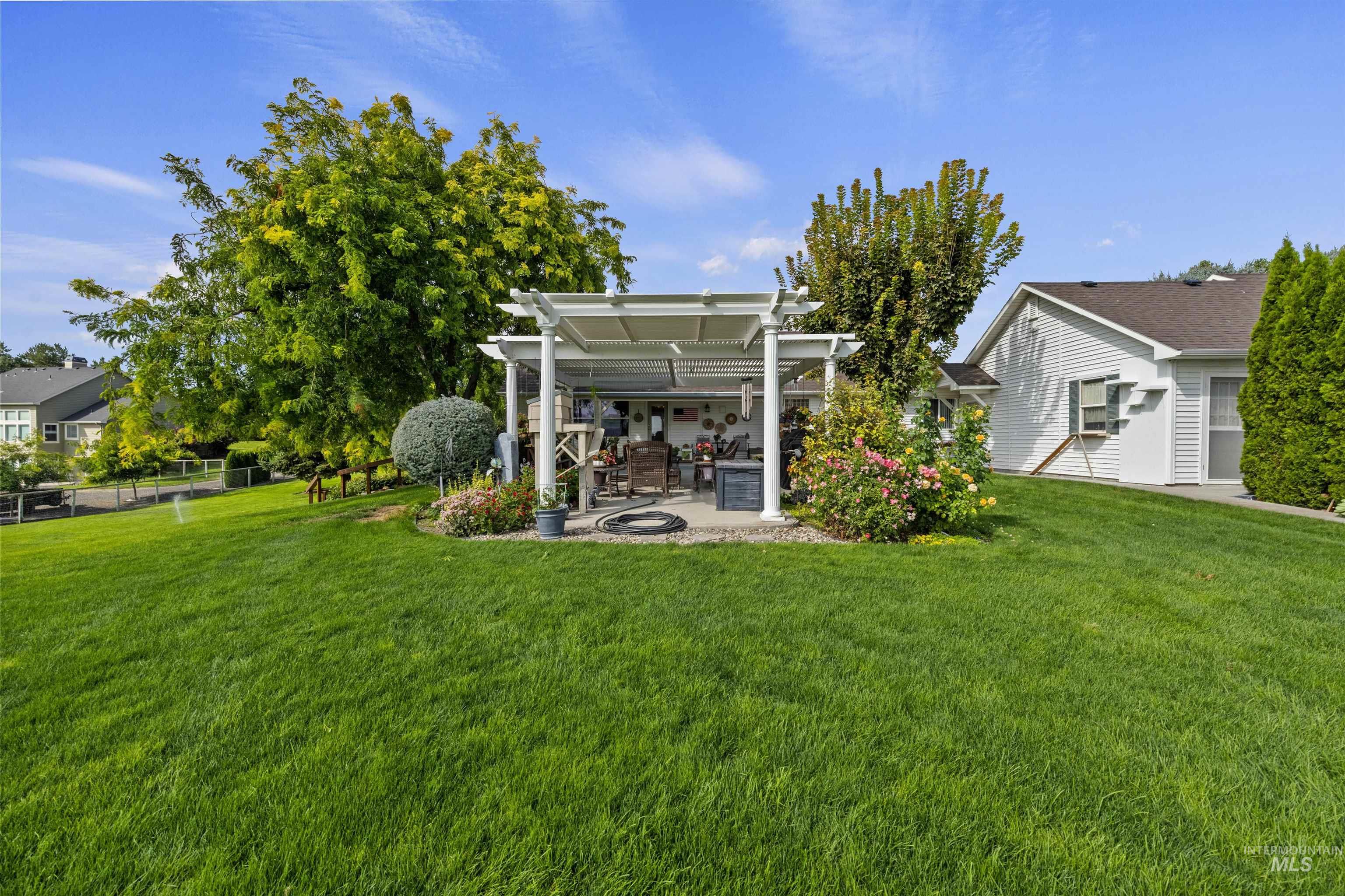 View of yard with a patio