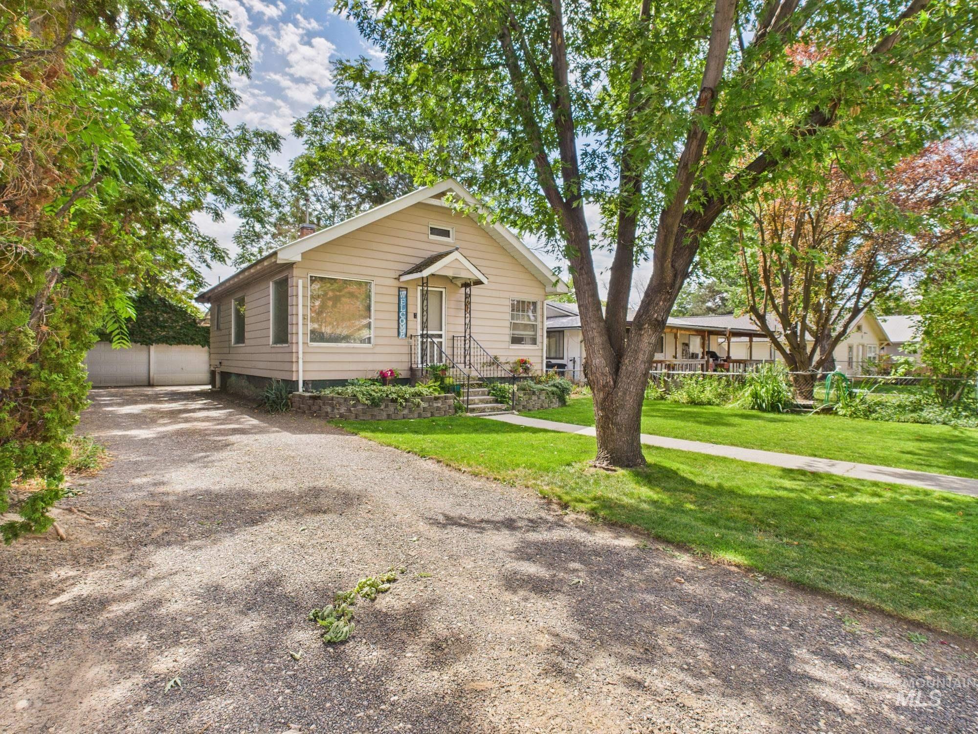 Bungalow-style home with driveway