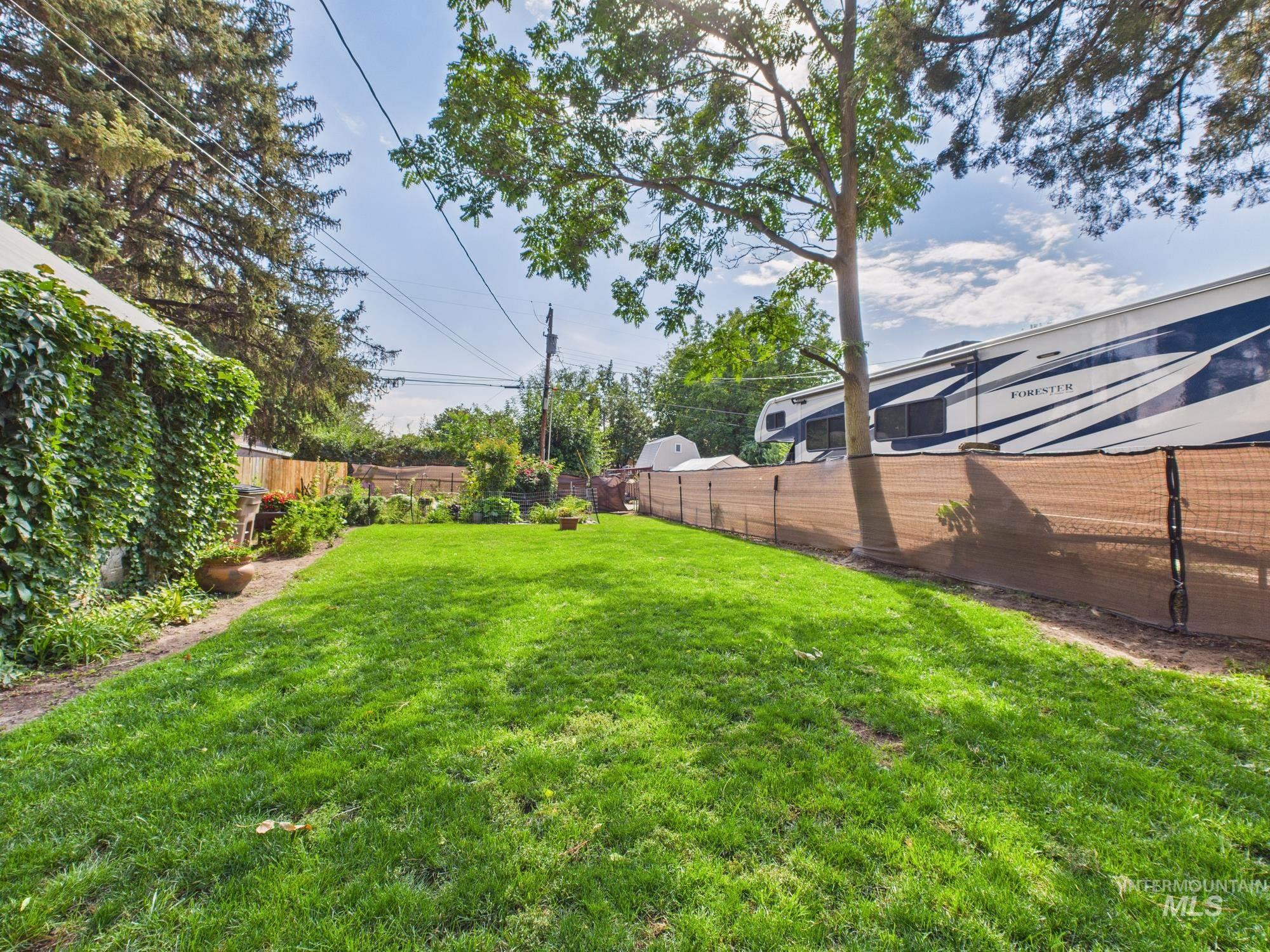 View of fenced backyard