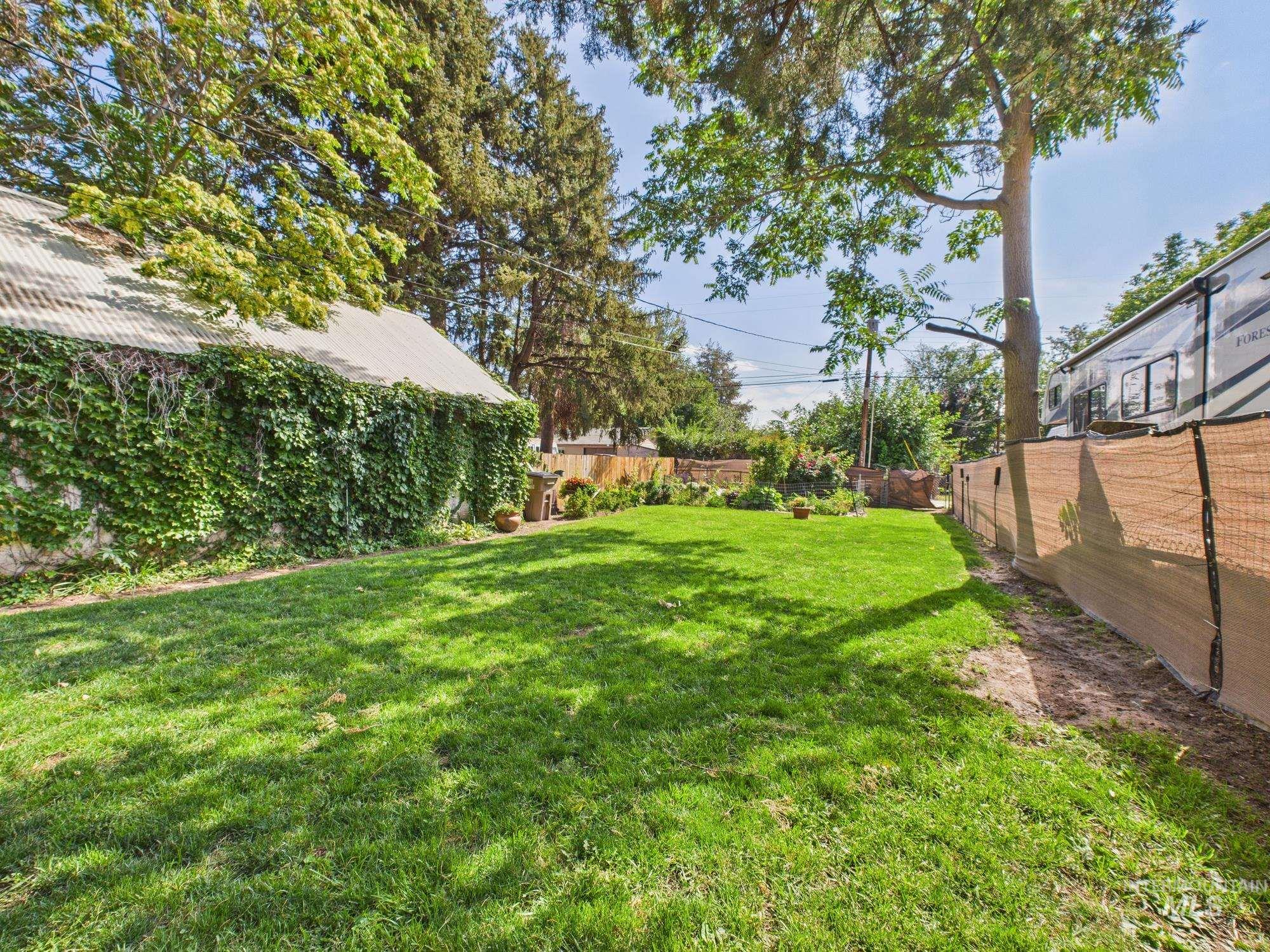 View of fenced backyard