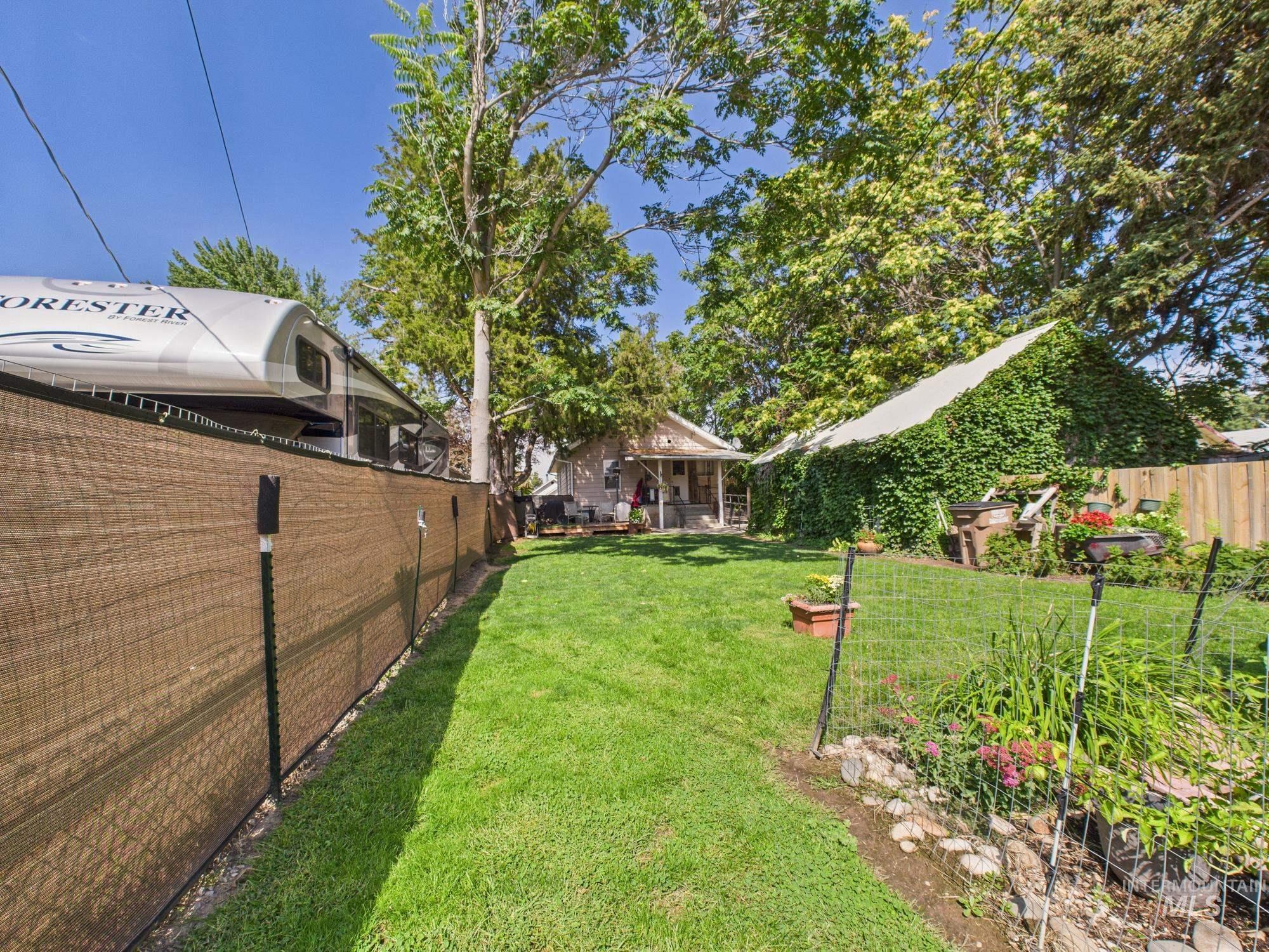View of fenced backyard