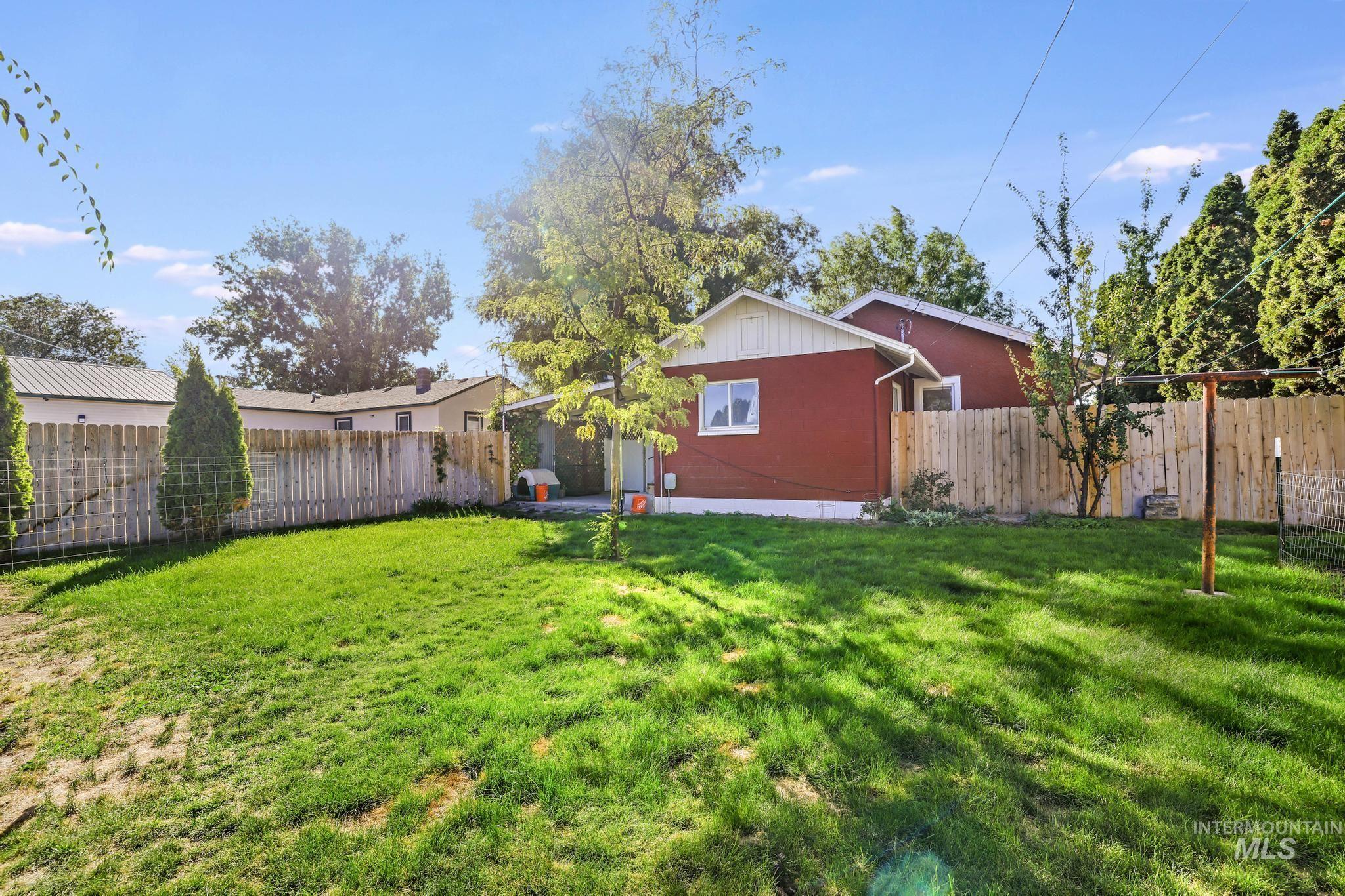 View of fenced backyard