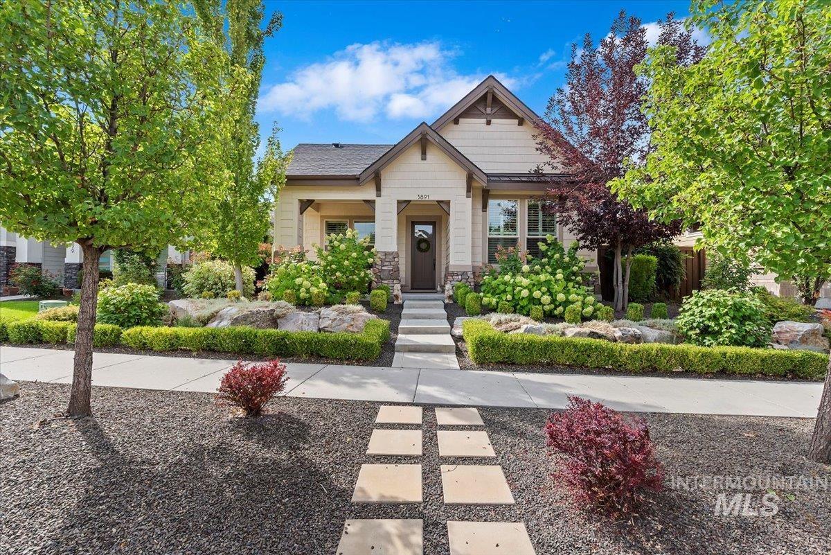 Craftsman house featuring stone siding