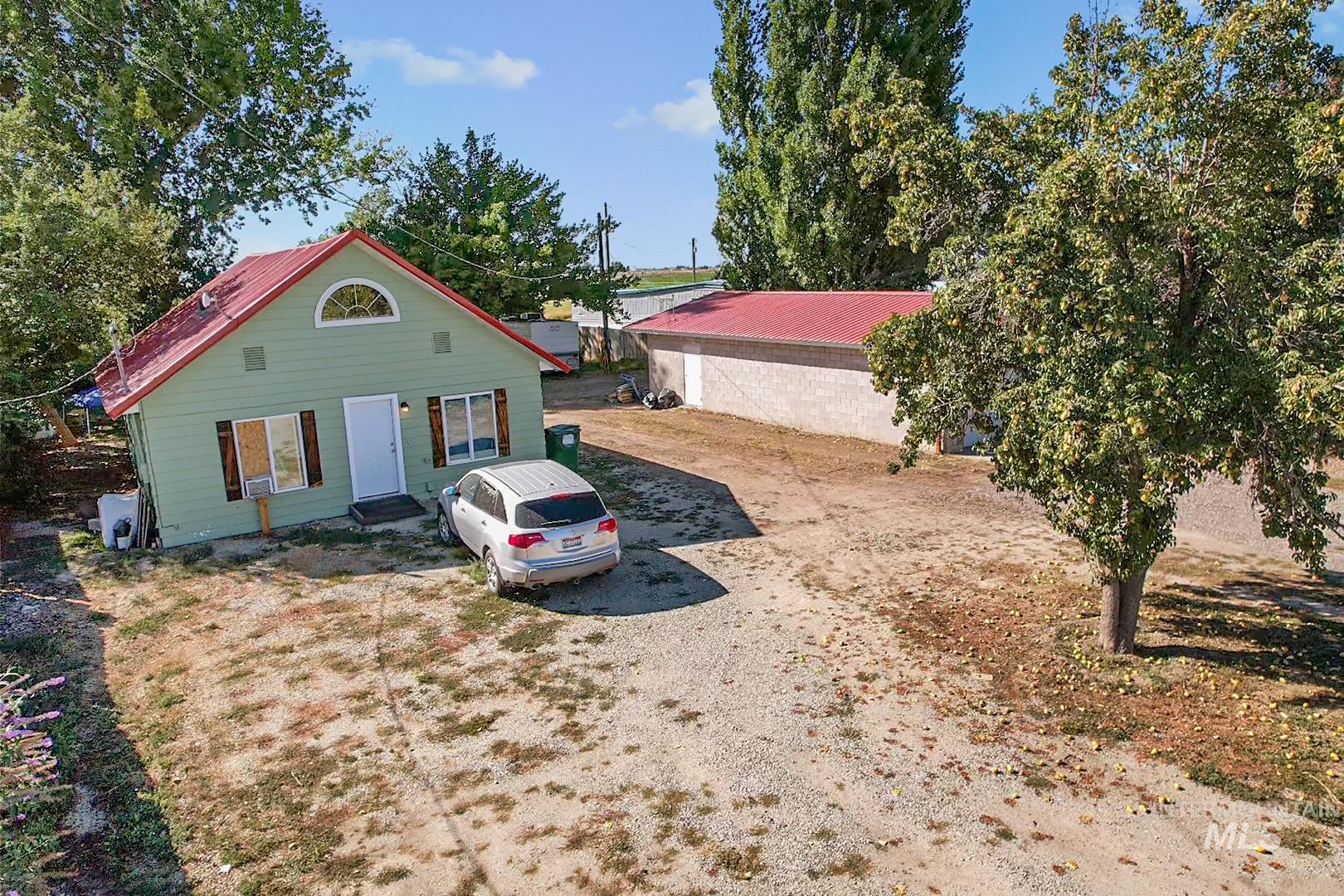 View of front of home featuring a metal roof