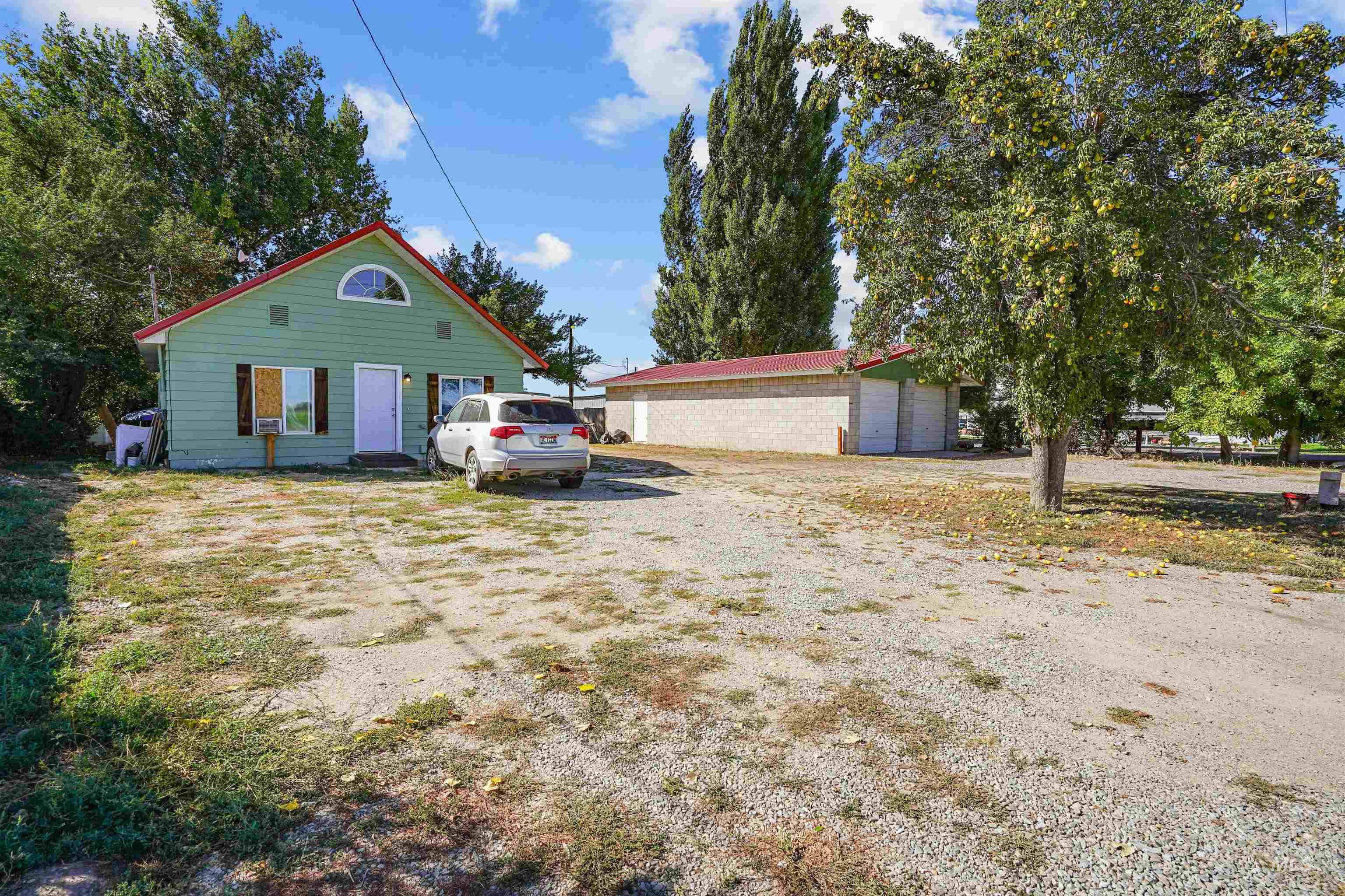 View of front of property with an outdoor structure