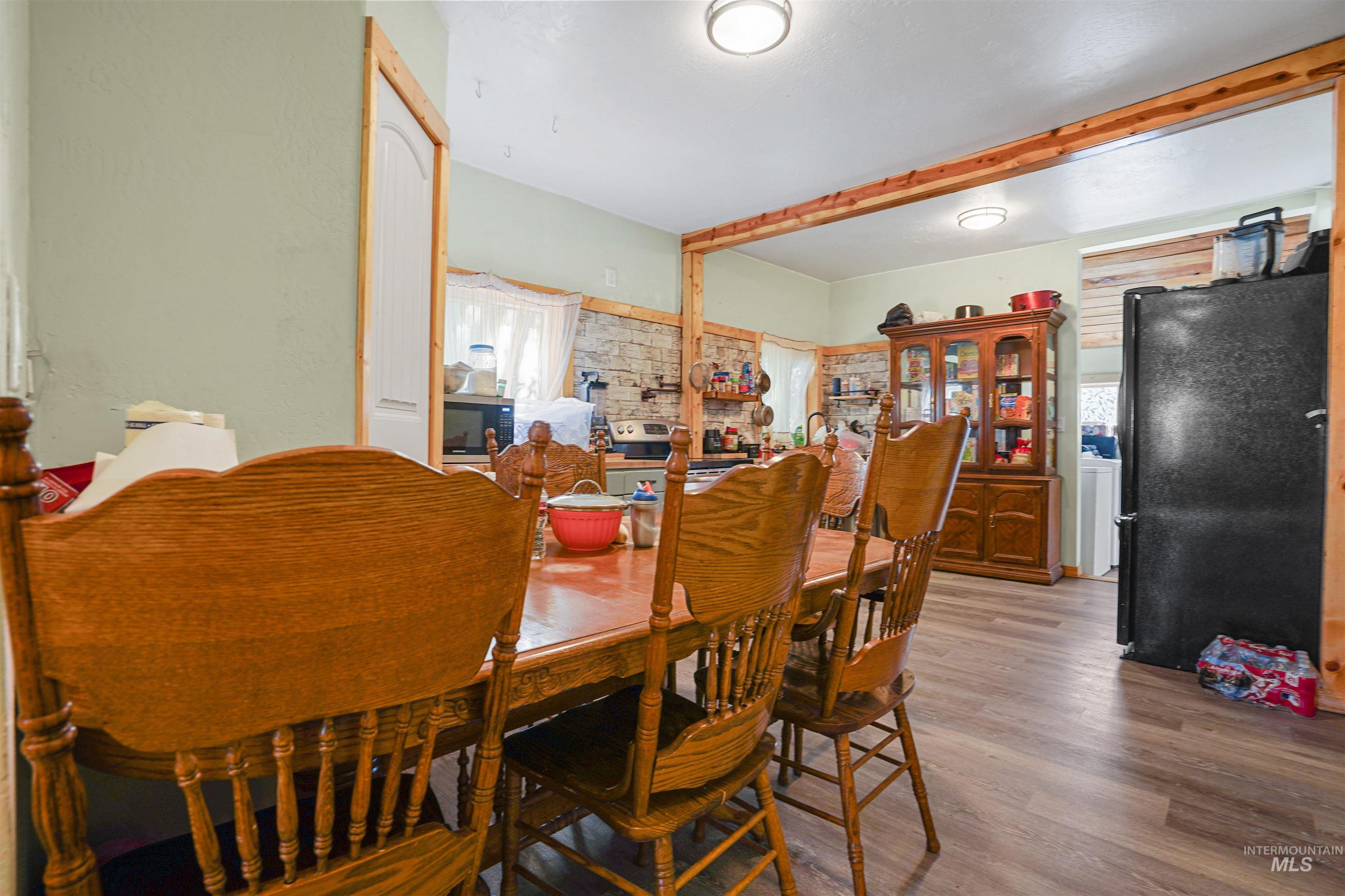 Dining room featuring wood finished floors