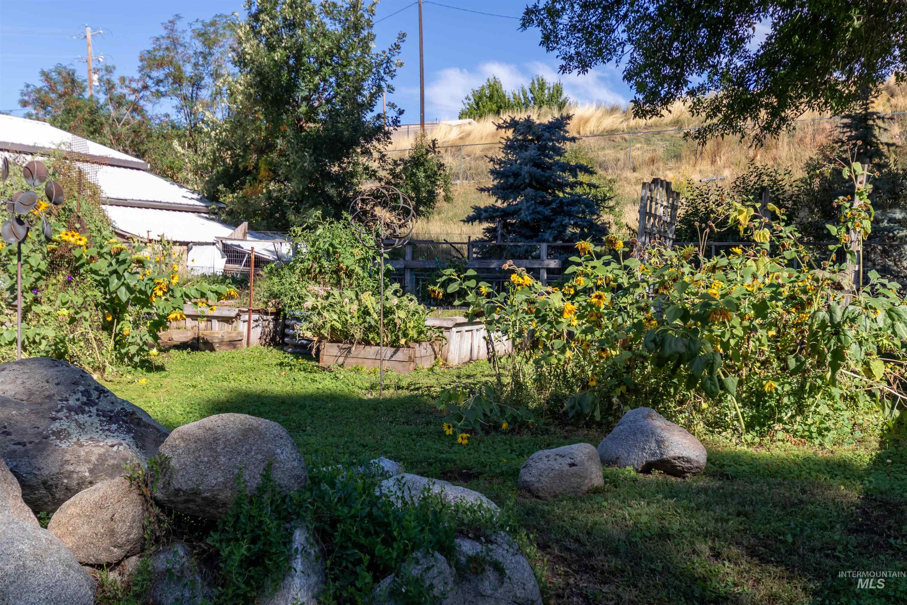 View of yard with a garden