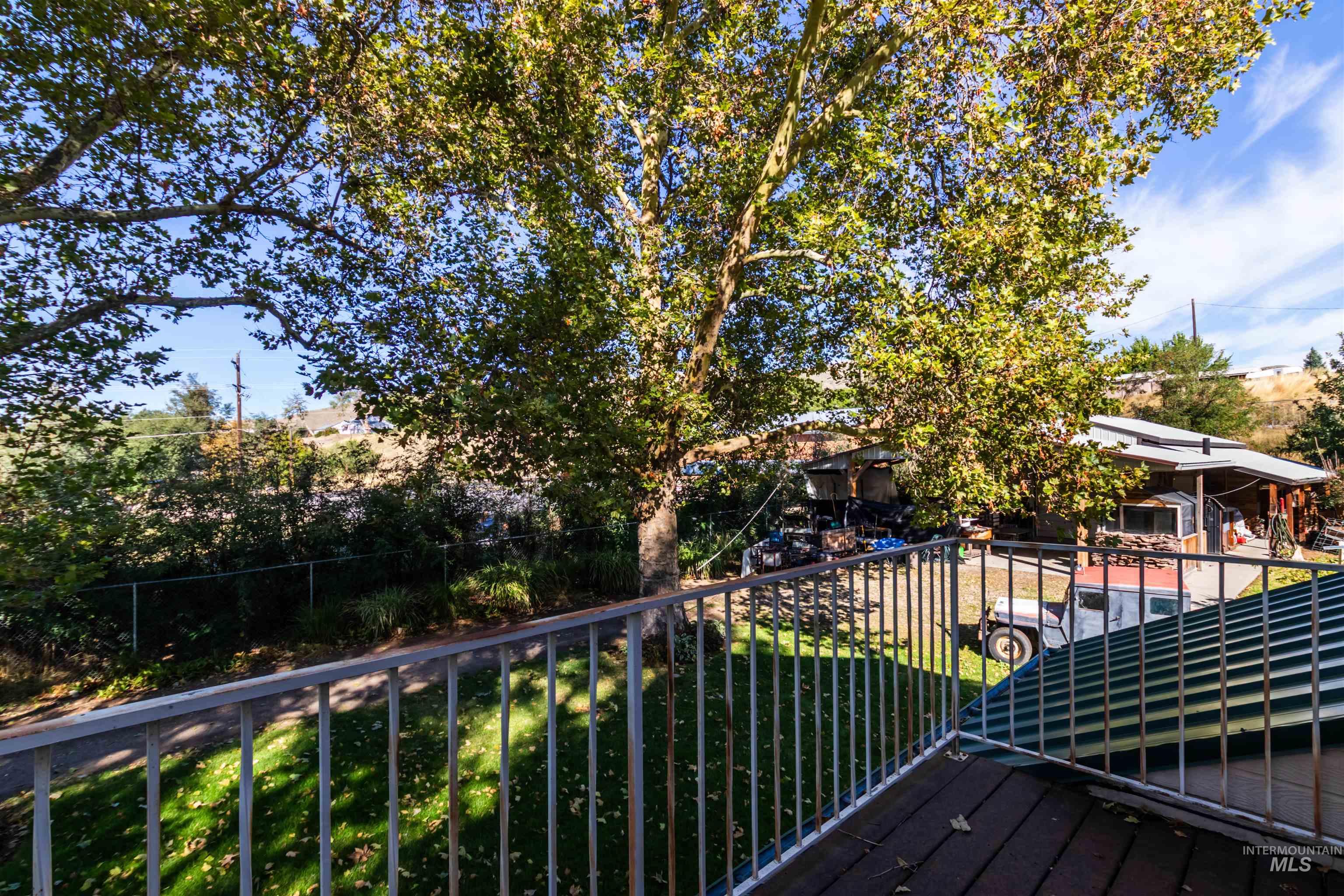 Wooden deck featuring a yard