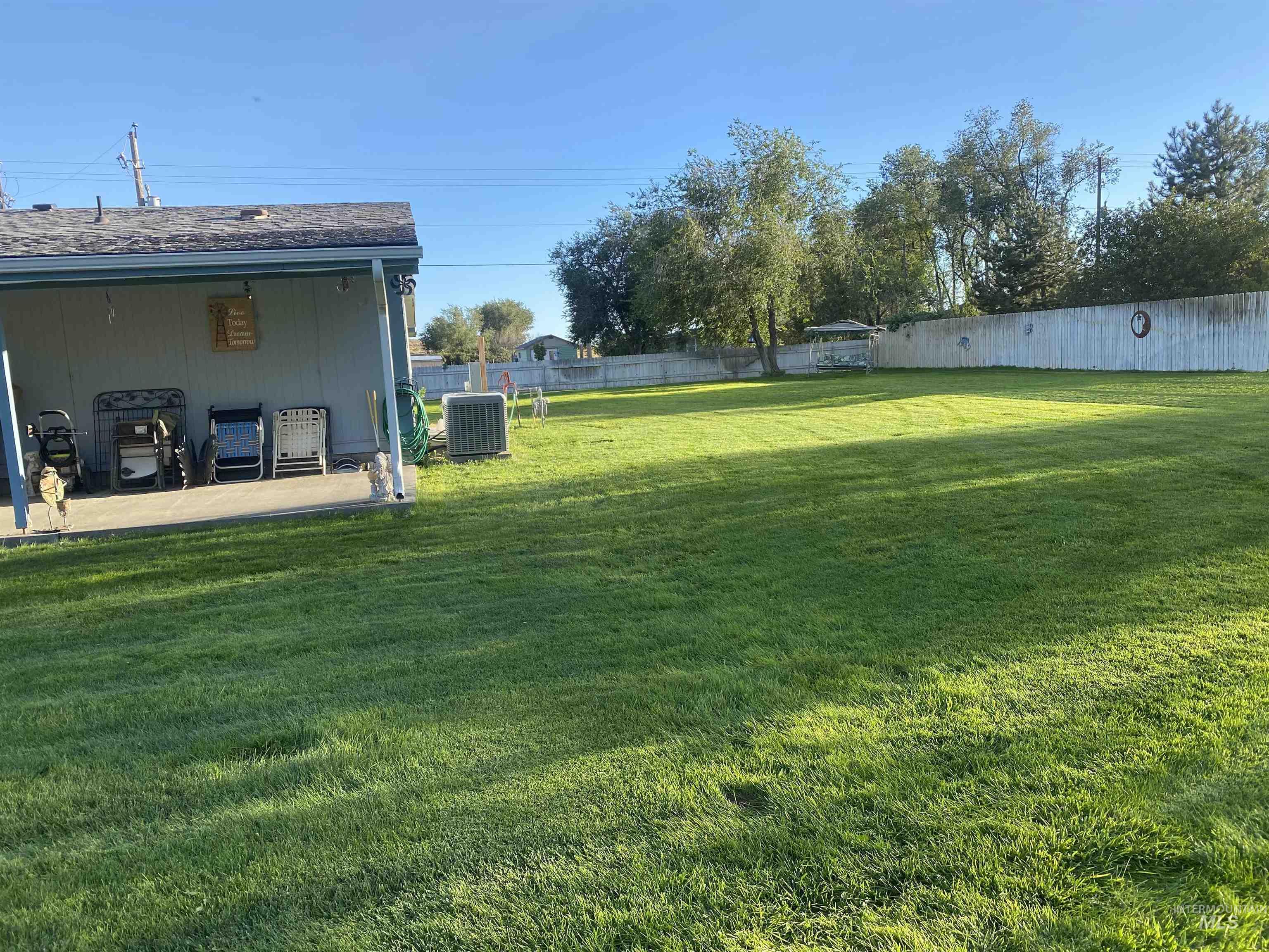 View of yard with a patio area