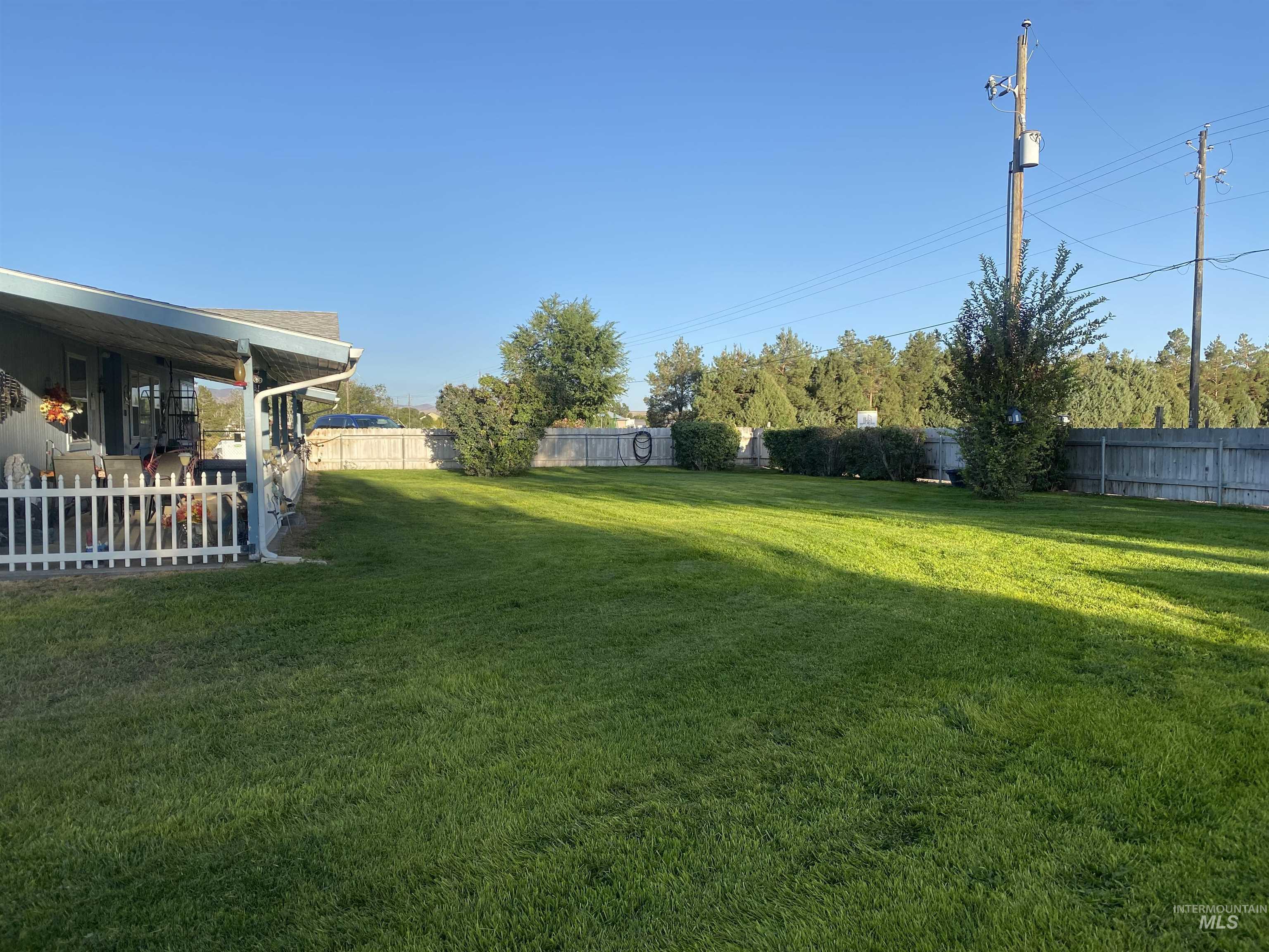 View of fenced backyard