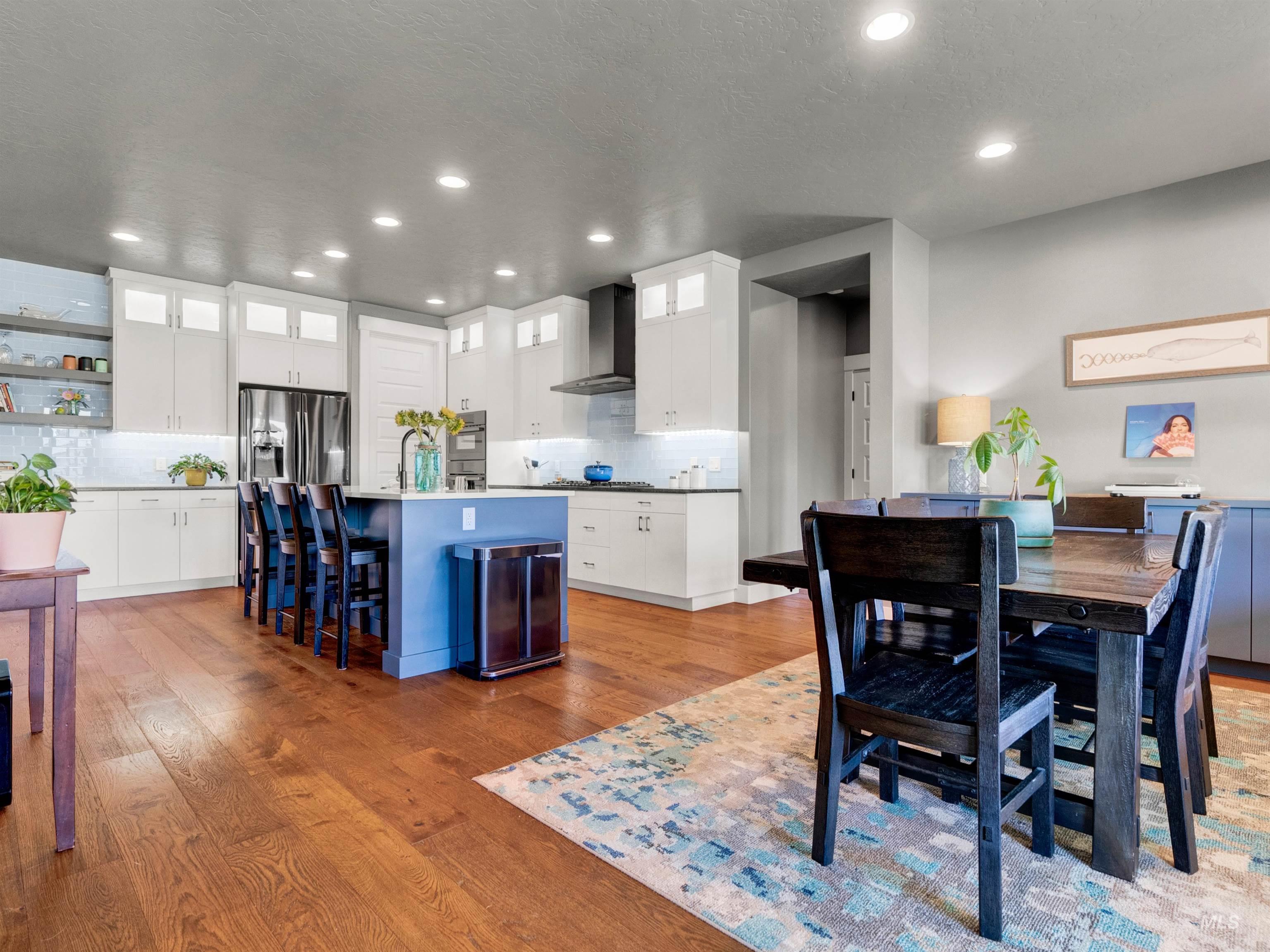 Dining space featuring recessed lighting and light wood-type flooring