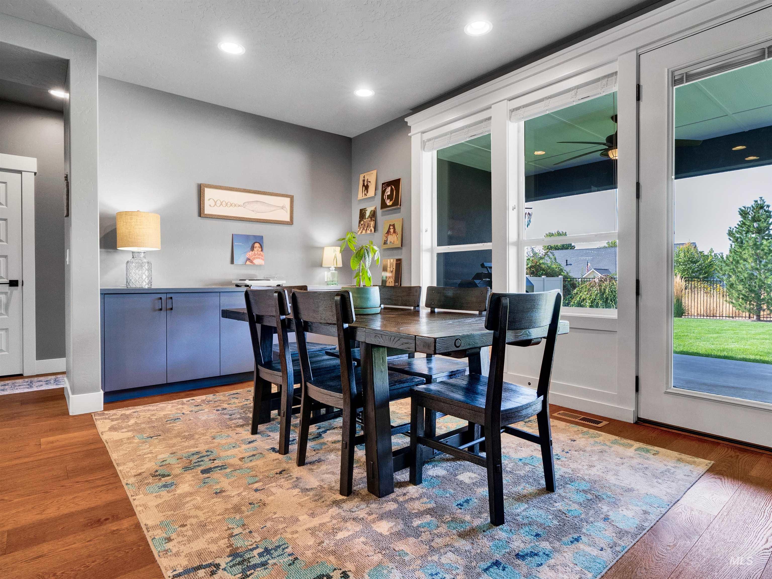 Dining space with recessed lighting, light wood-type flooring, and ceiling fan