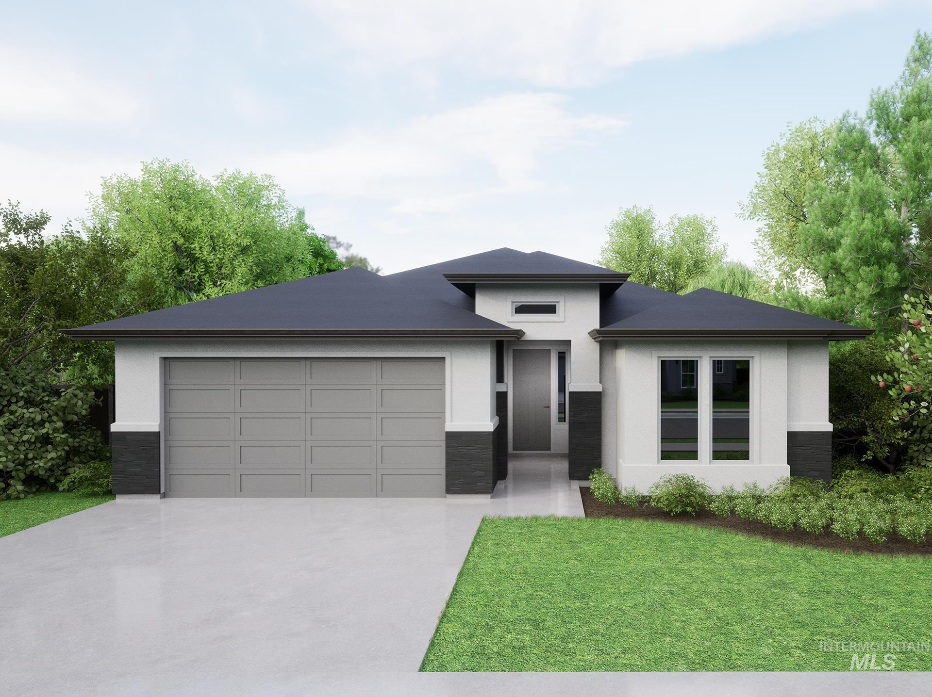 Prairie-style home featuring stucco siding, a front lawn, driveway, and a garage