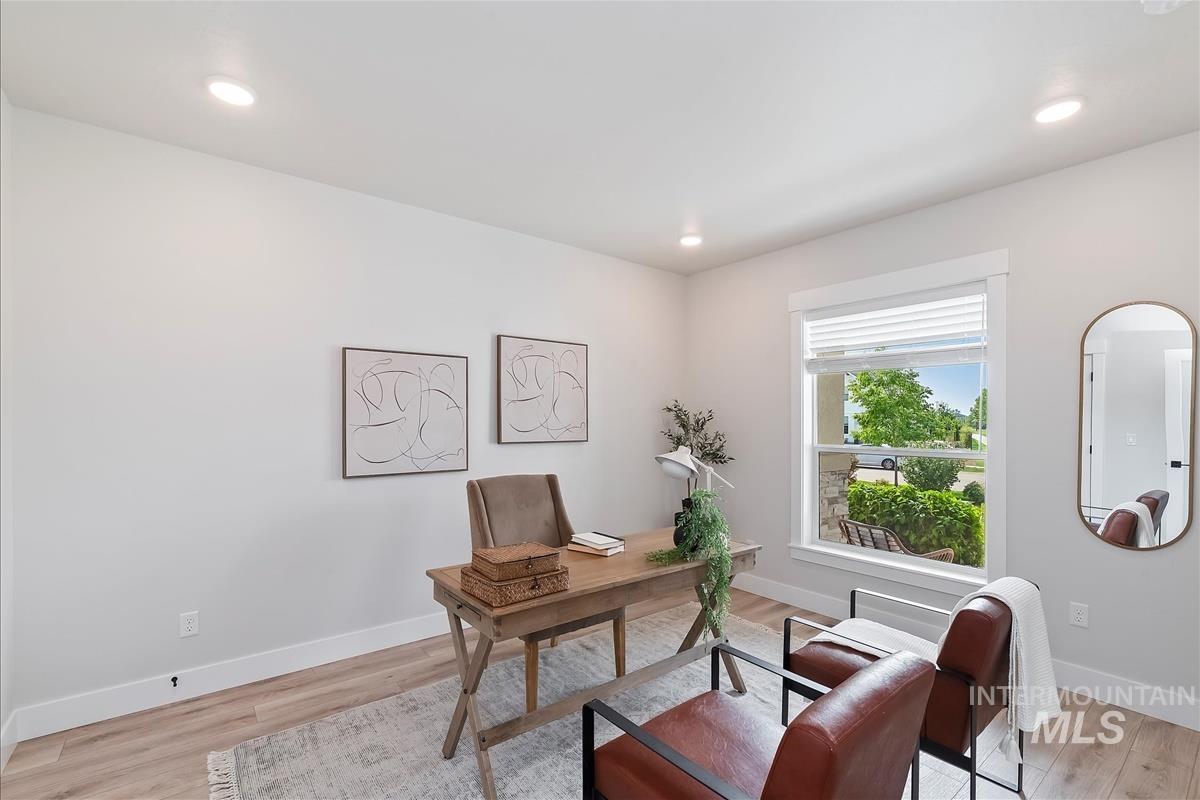 Office featuring recessed lighting and light wood-style flooring