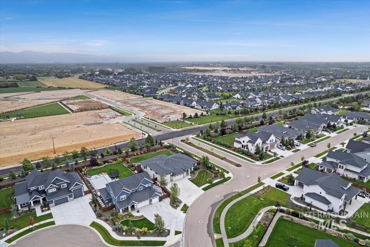 View of property location with nearby suburban area
