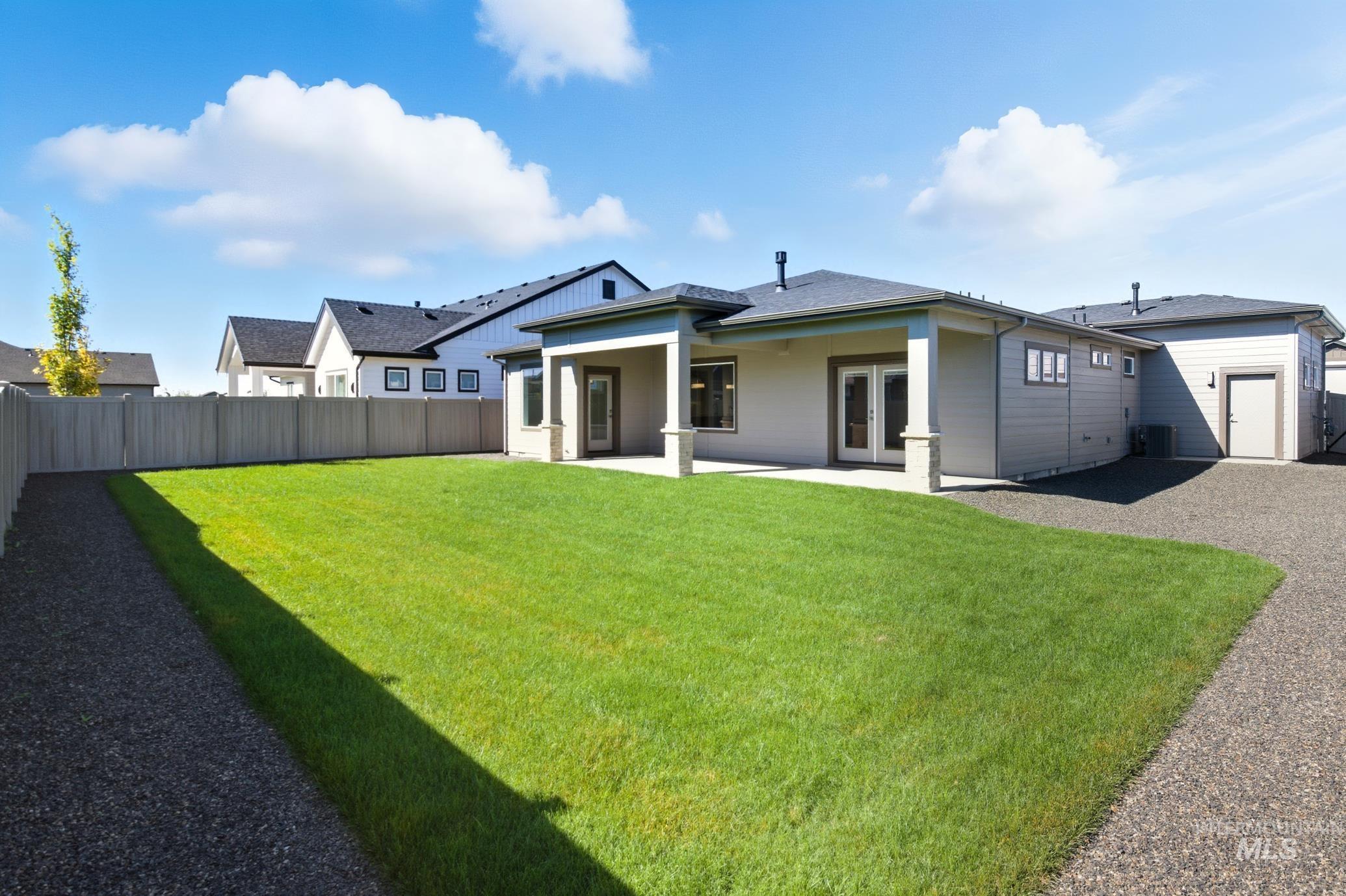Back of house featuring a patio area and a fenced backyard