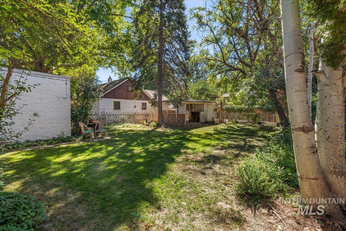View of fenced backyard