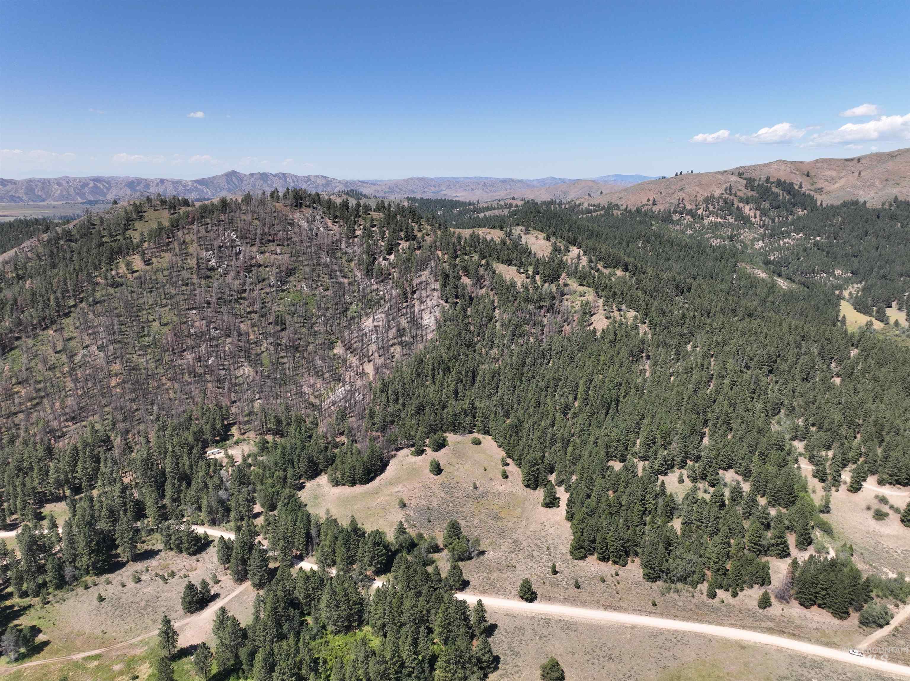 View of property location featuring a mountainous background