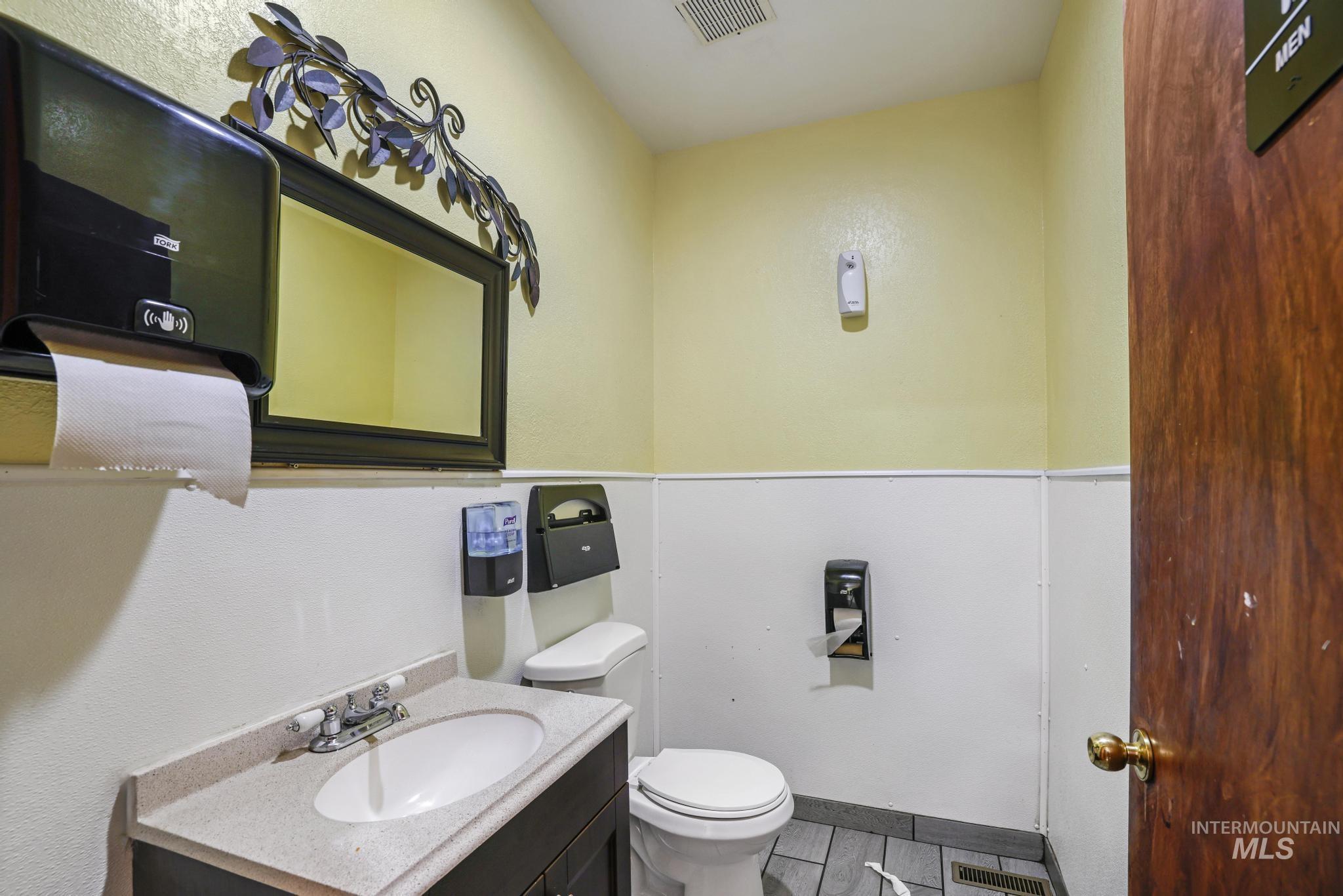 Bathroom with vanity and toilet