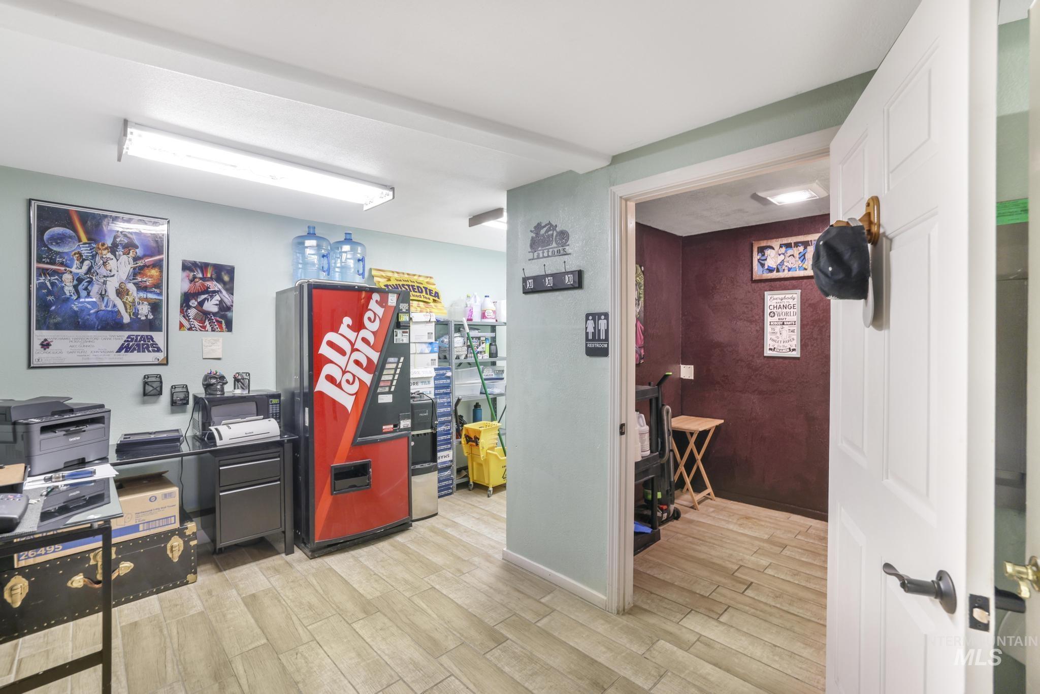Office space with light wood-style flooring