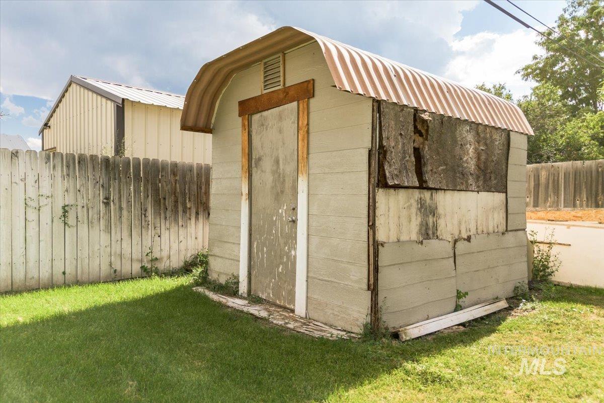 View of shed featuring a fenced backyard
