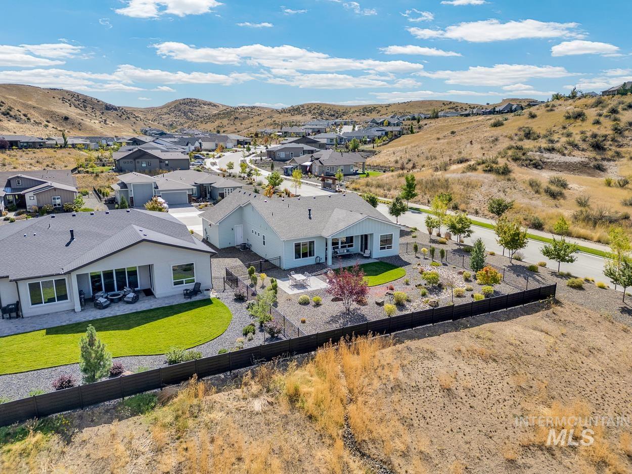 Aerial view of residential area with mountains