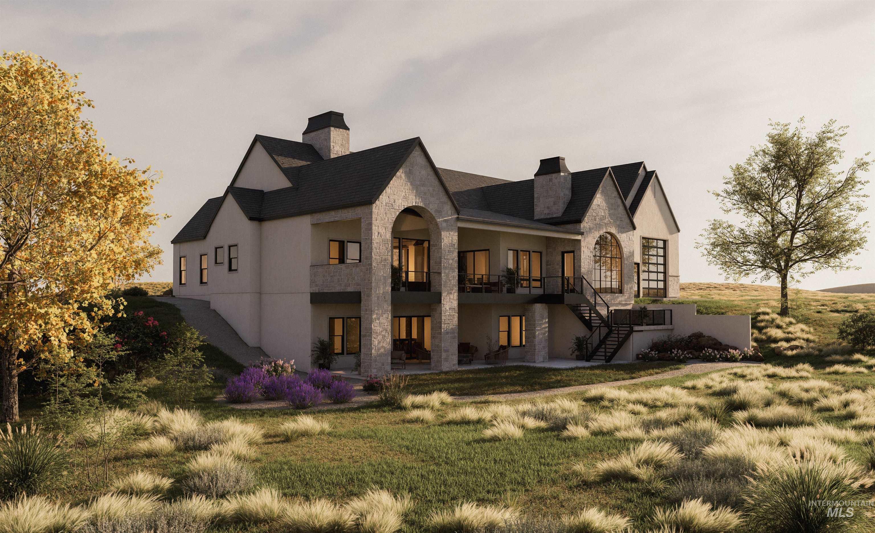 Back of house with stone siding, stairway, a chimney, a patio area, and a yard