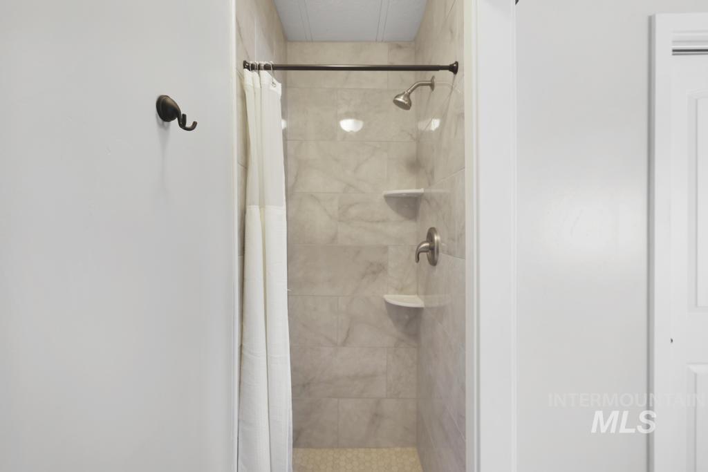 Bathroom with a shower stall