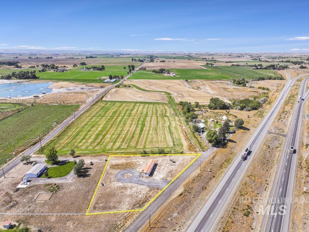 View of rural area with property boundaries highlighted and large plots for crops
