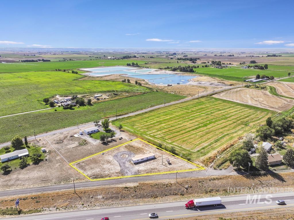 View of rural area with property parcel outlined and abundant farmland