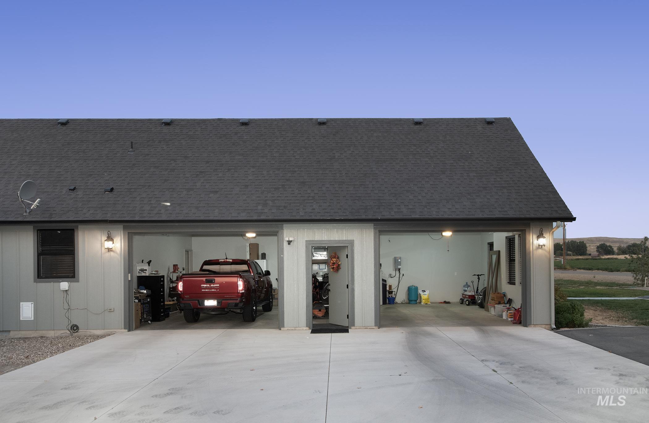 Garage with concrete driveway