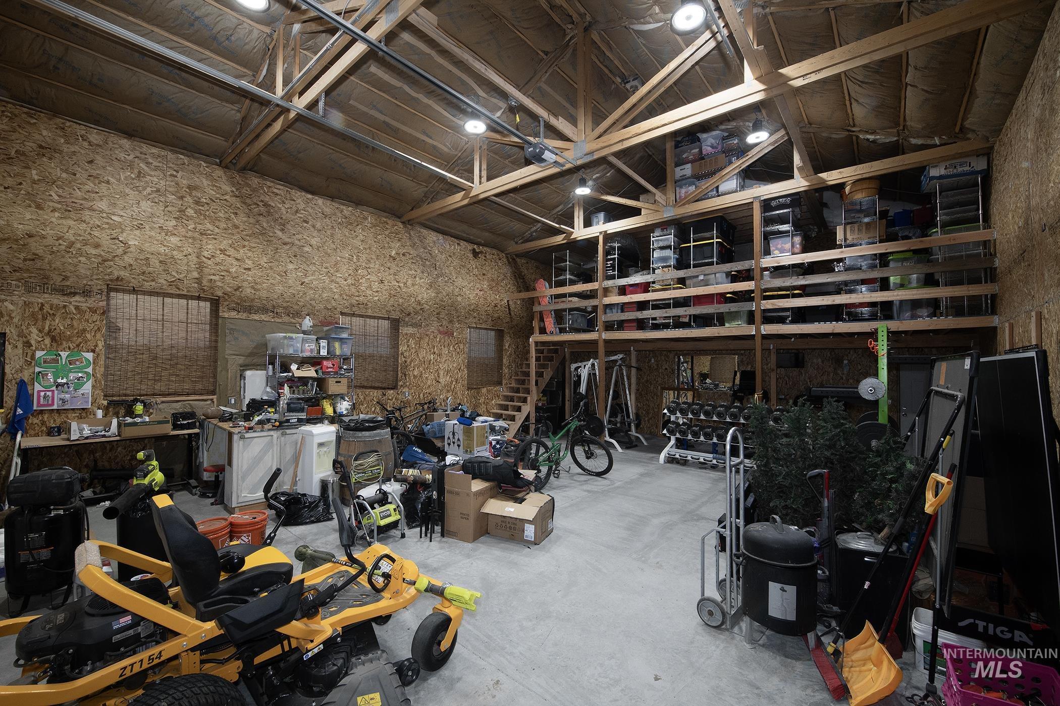 Garage featuring a workshop area