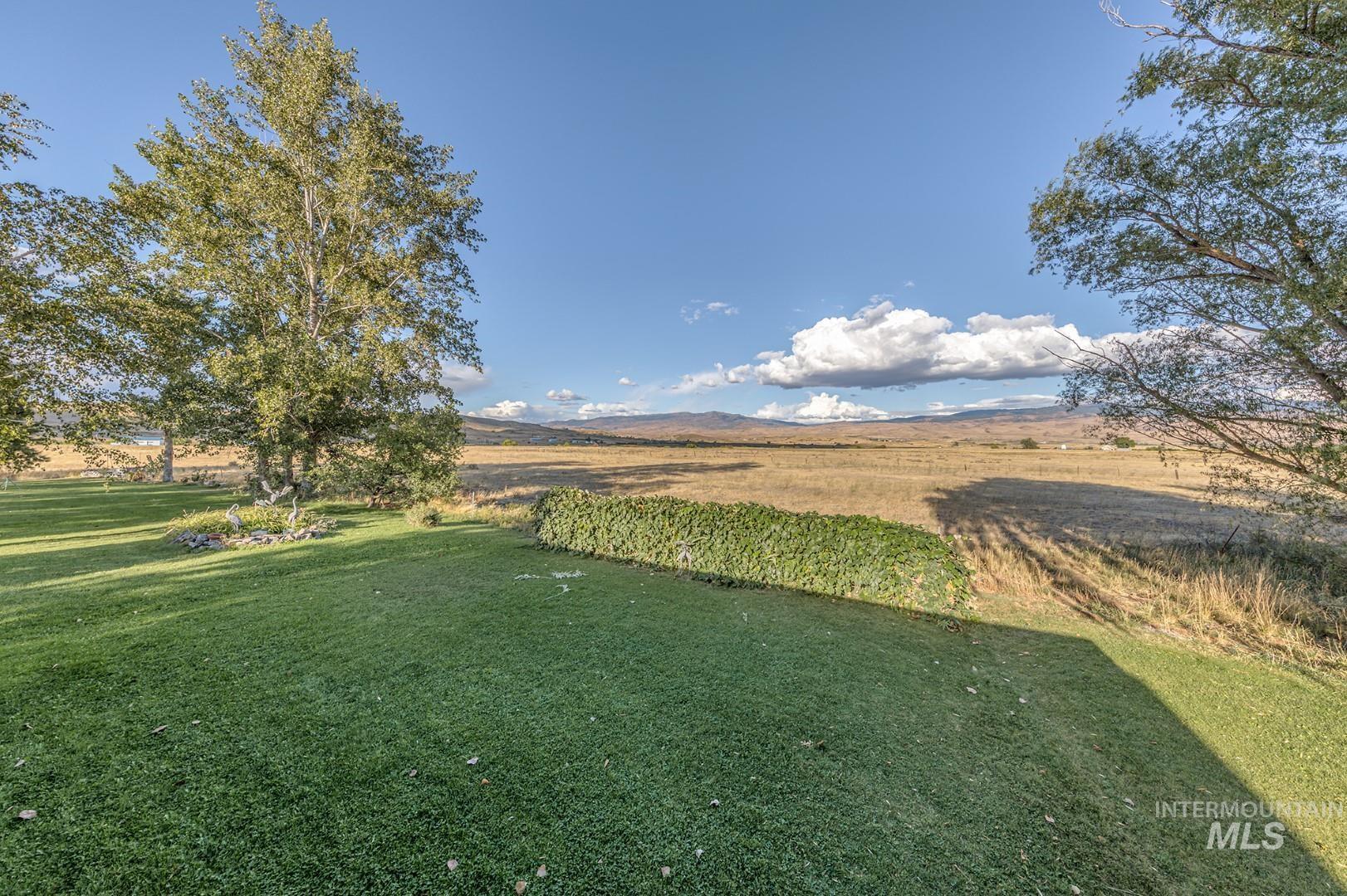 View of green lawn featuring a view of countryside